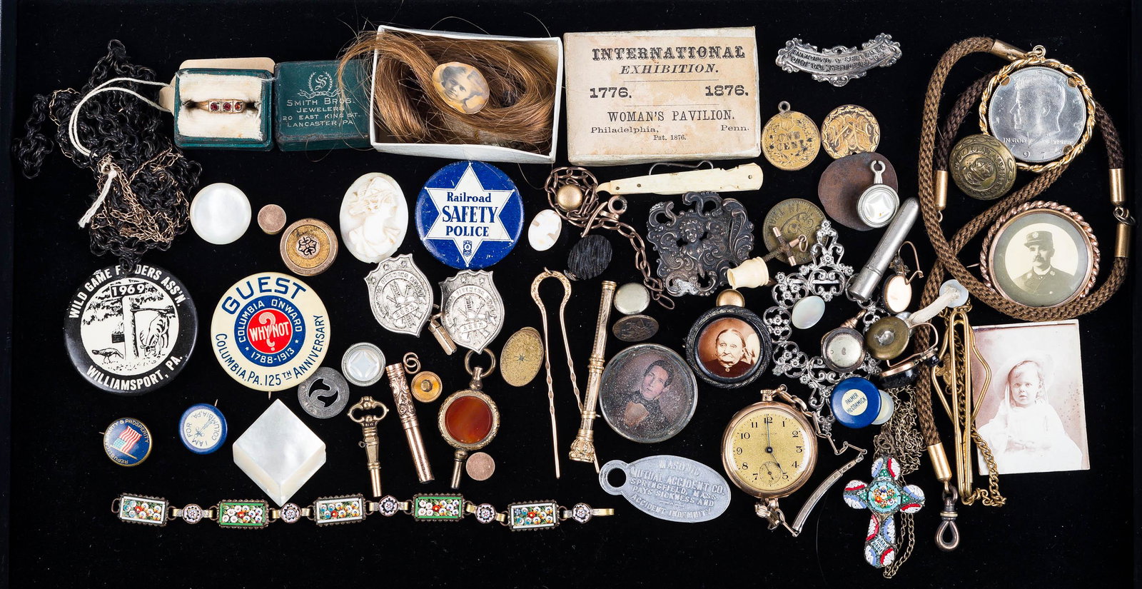 Antique Estate Victorian and Ephemera Collection: Lot includes Victorian Hair memorial jewelry and watch chains, jet glass mourning jewelry earrings, early tin type photo pins, including a fireman, two sterling silver buckles (one is a cherub), sever