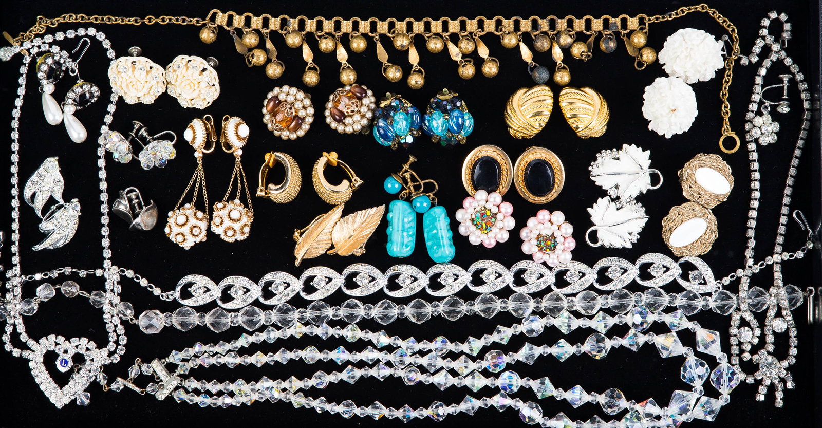 Estate Jewelry: Lot includes Arge clip earring collection, including Trifari, crystal, rhinestone, and others. Lot also includes two crystal necklaces.