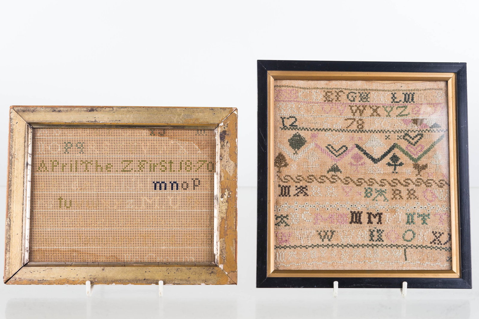 Small Frame Samplers, 19th C: Approximately 6.5"H x 6"W (exposed area of largest). Good needlework on homespun with alphabets and numeration. Item is signed Mary Barrow. Second item has light colors and faded graphics, and it is d
