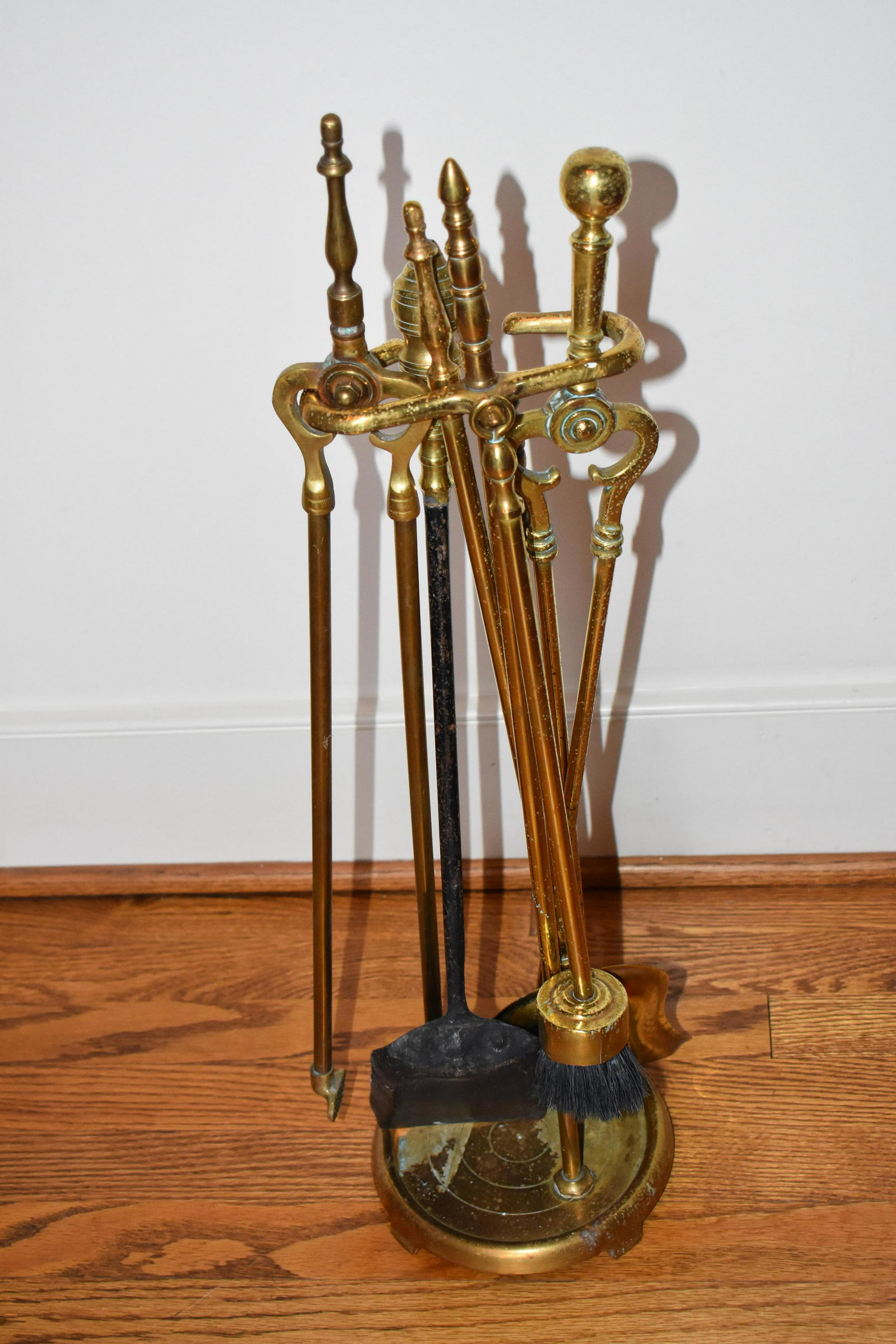Vintage Brass Fireplace Tool Set: This set includes a poker, two pincers and two shovels on a stand. It is available for pick up from our Chestnut Hill / Philadelphia location by appointment.