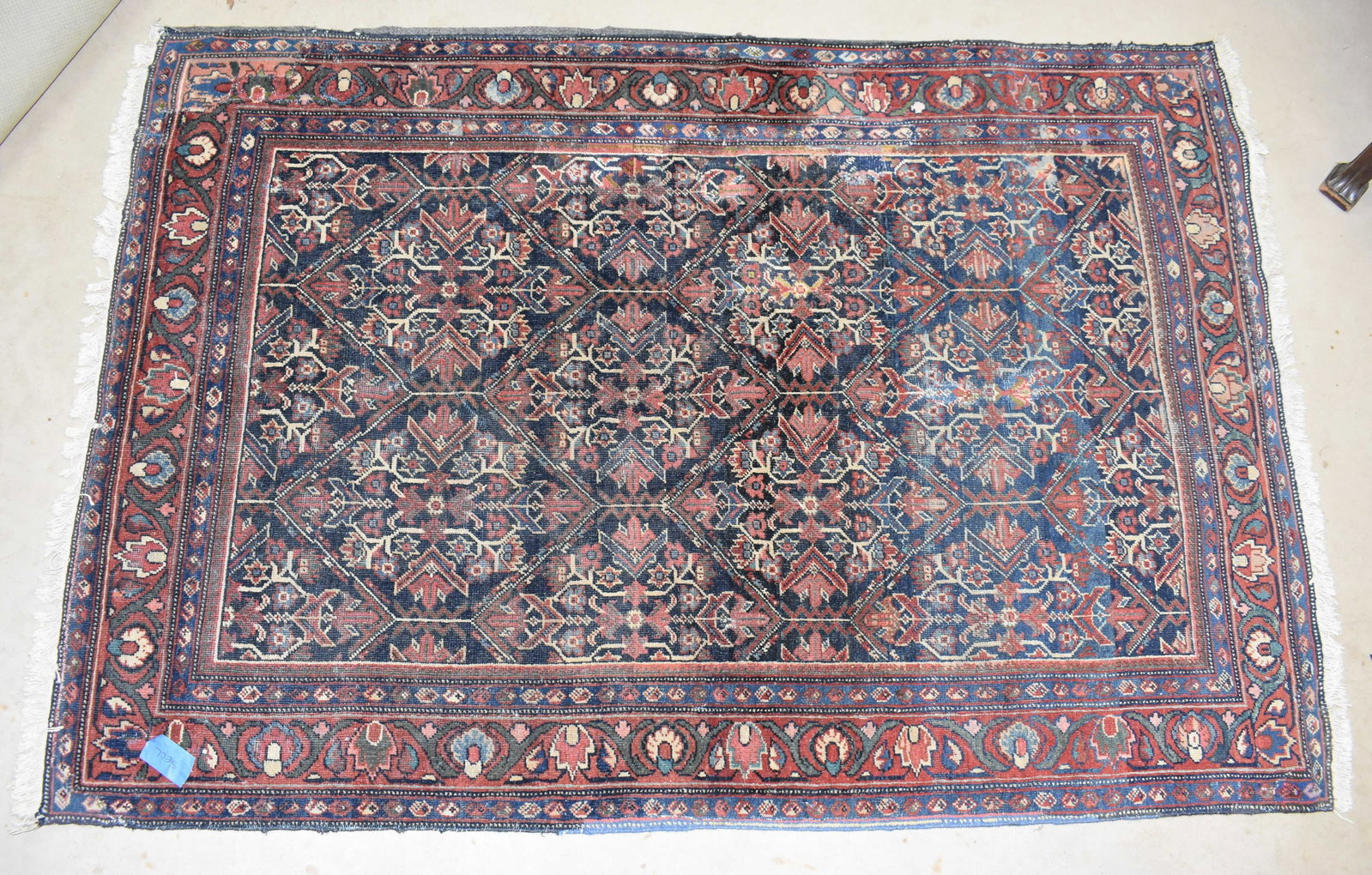 Semi Antique Oriental Carpet: Carpet has some fading and possible repair, and it measures approximately 55"W x 81"L. Turkish tag on back. It is available for pick up from our Chestnut Hill / Philadelphia location by appointment.