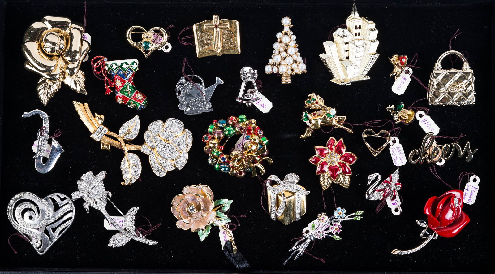 Holiday and Other Designer Jewelry: Lot includes Swarovski swan, various Nolan Miller items, Monet poinsettia pin, and various other makers.