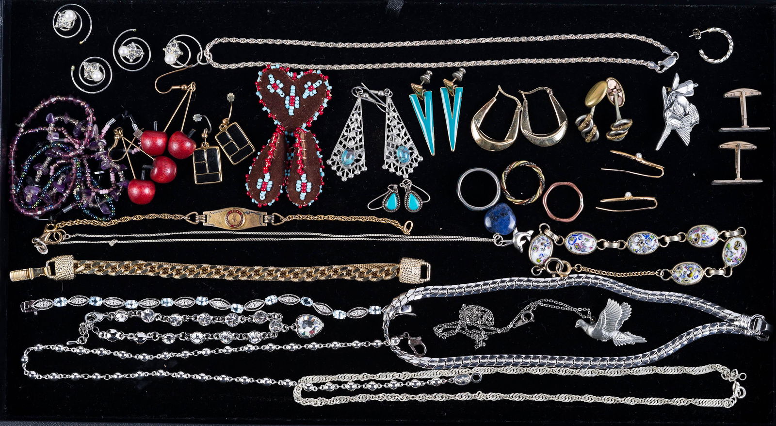 Sterling and Other Costume Jewelry: Lot includes mesh Italian sterling chain, Italian sterling chain with pendant and faux pearl and three matching items, silver tone Napier beaded chain, a heavy Coro herringbone choker, pewter bird pin