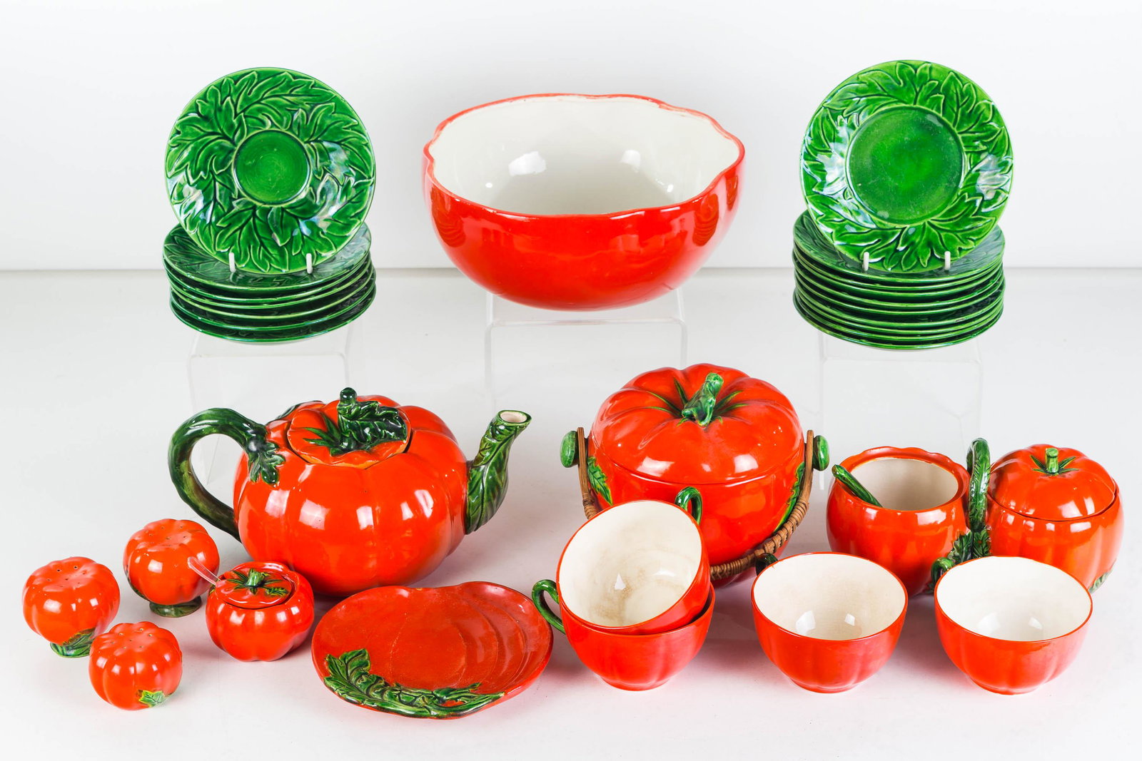 Collection of Maruhon Japan Tomato China: Lot includes teapot (5"H), 4 cups and 7 saucers, 10 under plates, 3 salt and pepper shakers, a mustard pot, a small tray, a biscuit (marked Occupied Japan), a 1962 Holt Howard bowl in a similar patter