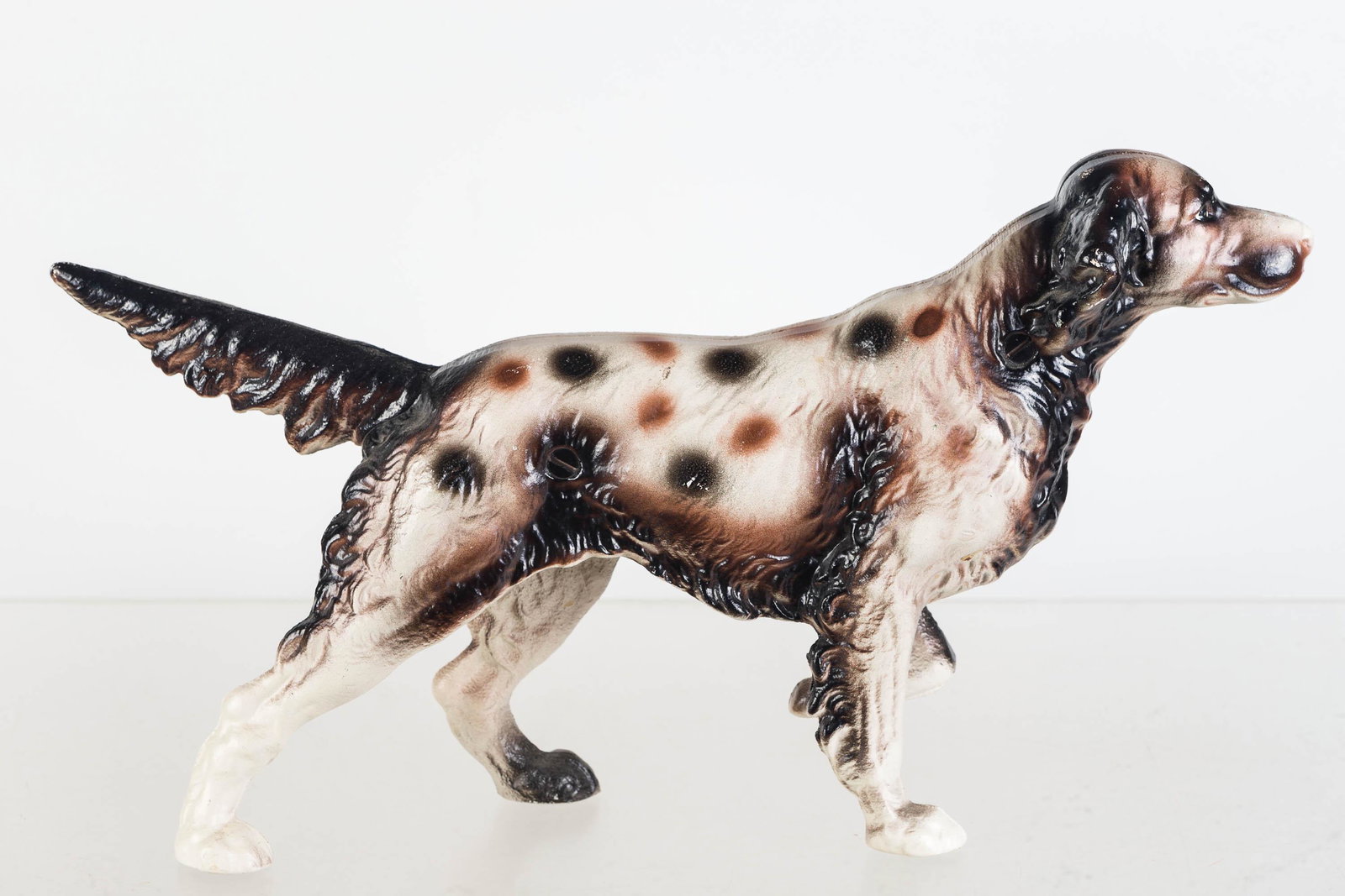 Cast Hunting Dog Doorstop: Item measures approximately 8.5"H x 15"L. It is two-piece cast iron doorstop with a straight head screw. Age is unknown.