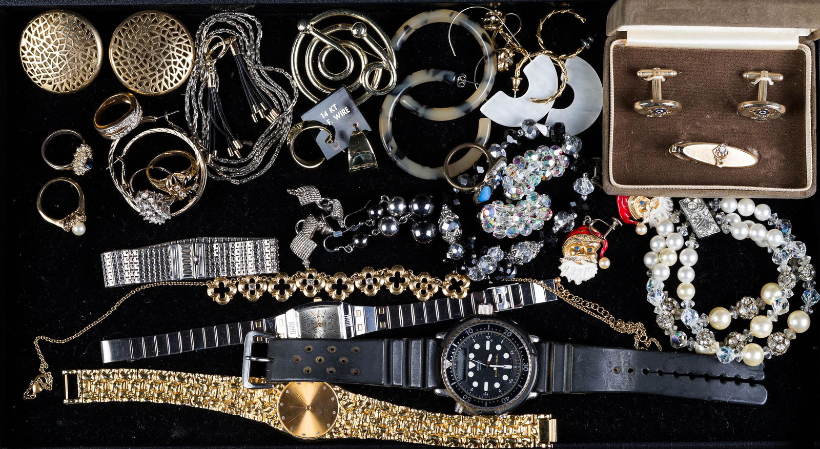 Watches and Costume Jewelry: Lot includes a Seiko Diver's watch (Case No. 740886), a ladies Suizo, a gold nugget style ladies watch, a Dante cufflink and tie tack set in box, various clip and post earrings, and crystal jewelry.