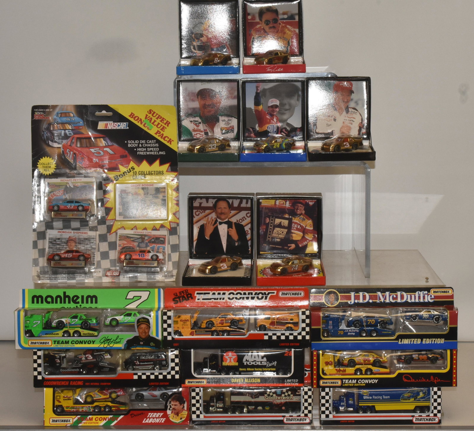 NASCAR Die Cast Vehicles: Lot includes Dale Earnhardt Matchbox vehicles, Richard Petty, and White Rose collectible vehicles. All are NIB.