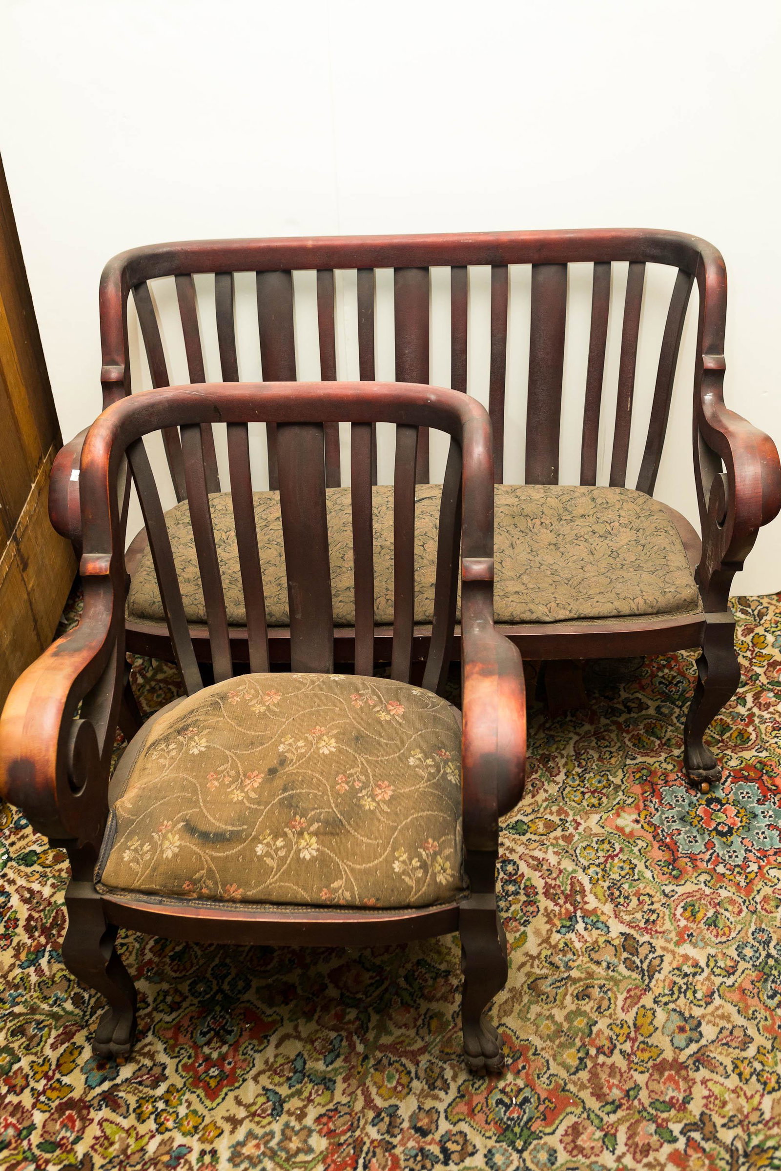 Victorian Settee and Chair: Settee approximately 47"W. Both pieces are bent wood mahogany with claw feet. Original upholstery.