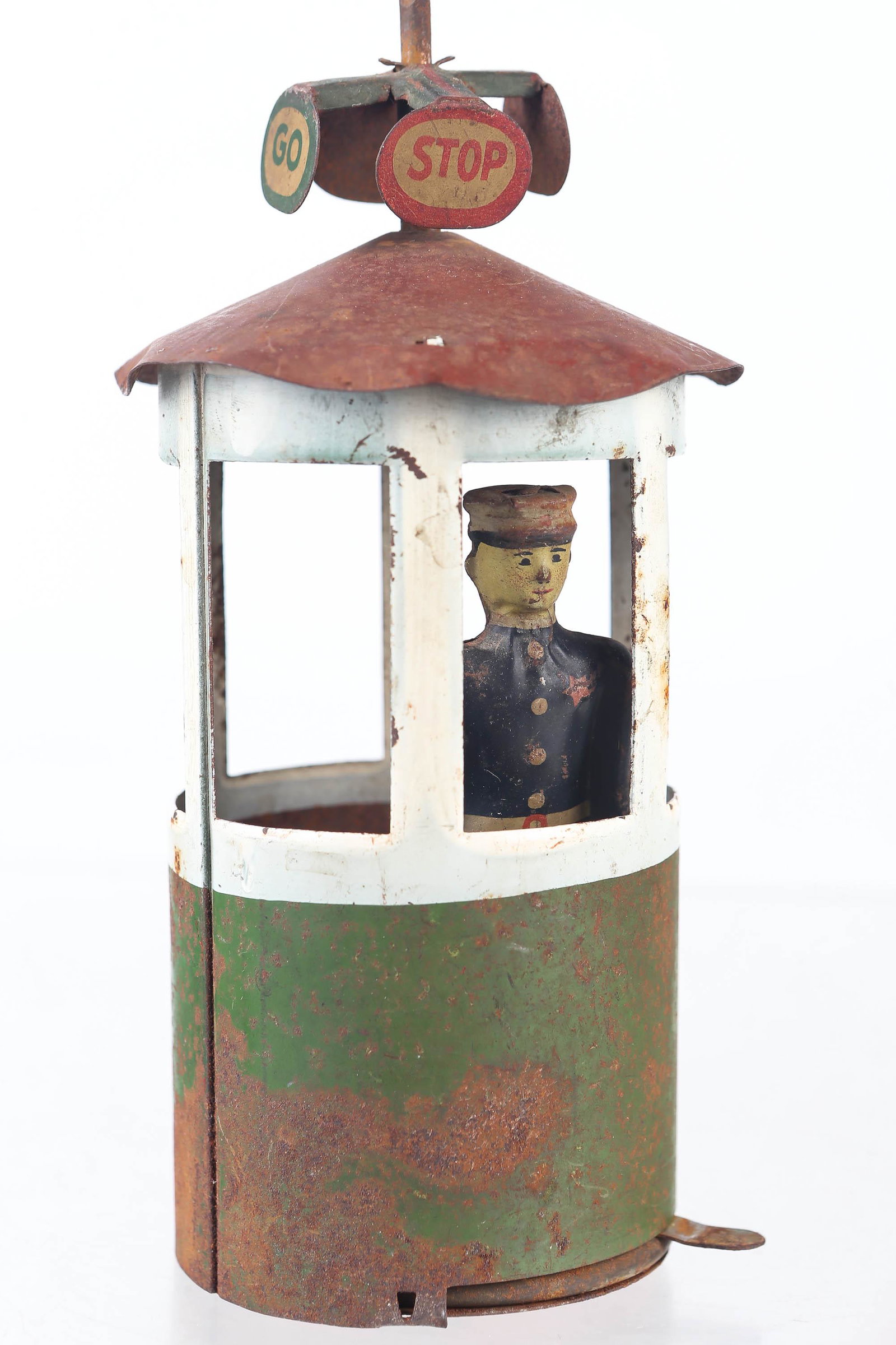 Early German Medal Traffic Police Booth: Measures 7" high circa 1920's with lever on bottom which rotates both sign on top and man inside. Oxidation throughout but nice for age.
