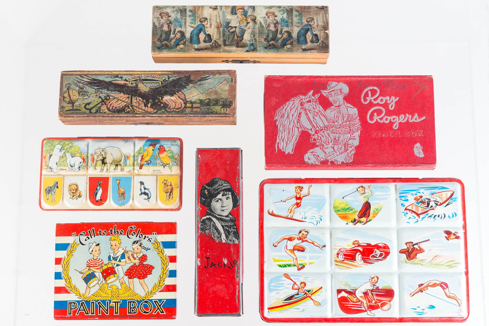 Tin Litho Paint Sets and Wooden Pencil Boxes: Lot includes tin litho watercolor sets (first two sets are near complete), a Roy Rogers pencil box with writing on cover, tin litho pencil box, and two Victorian wooden pencil boxes