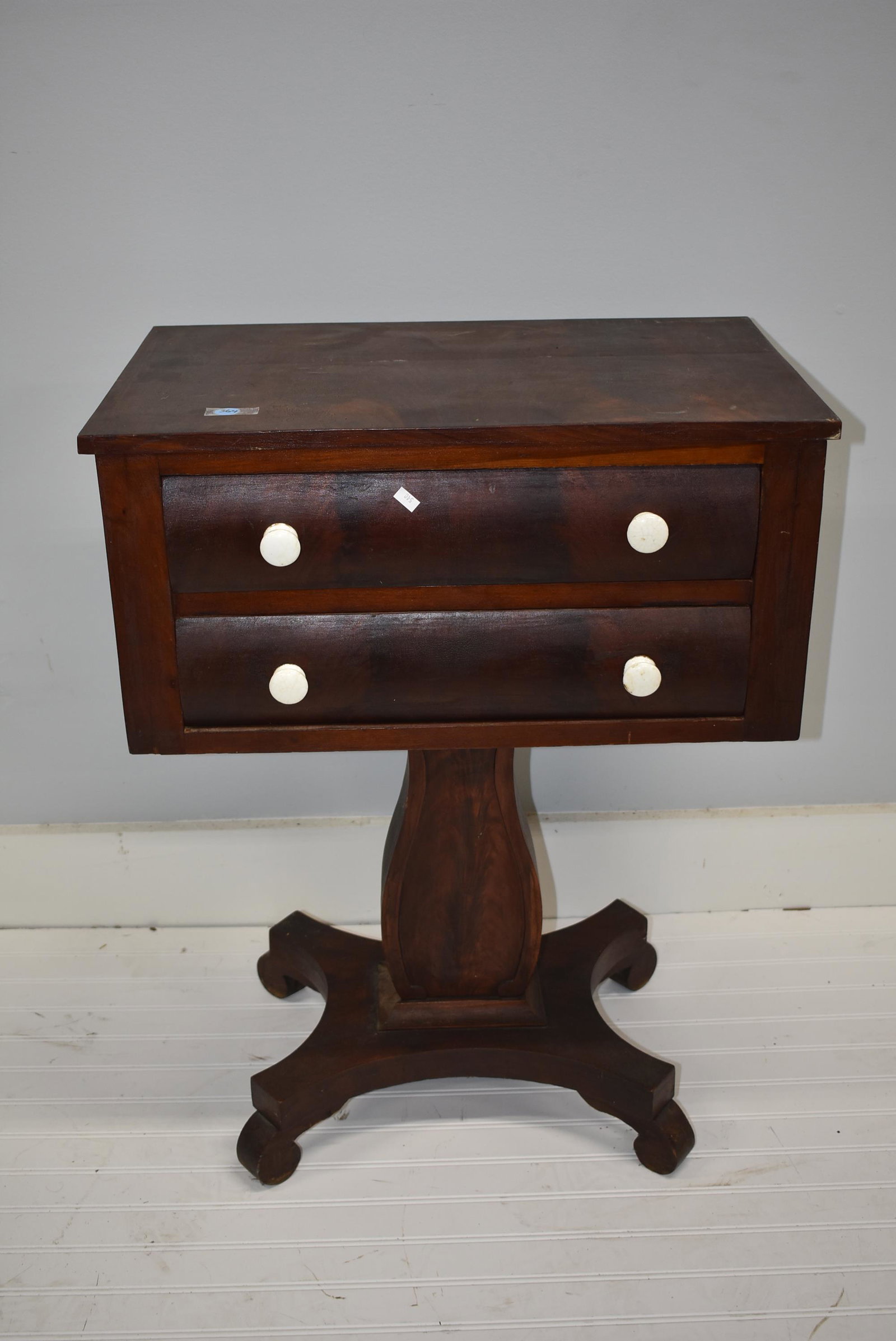 Two Drawer Work Table, 19th C: Table measures 29.5"H x 22.5"W x 14"D. Hand dovetailed drawers, and it stands on scroll foot.