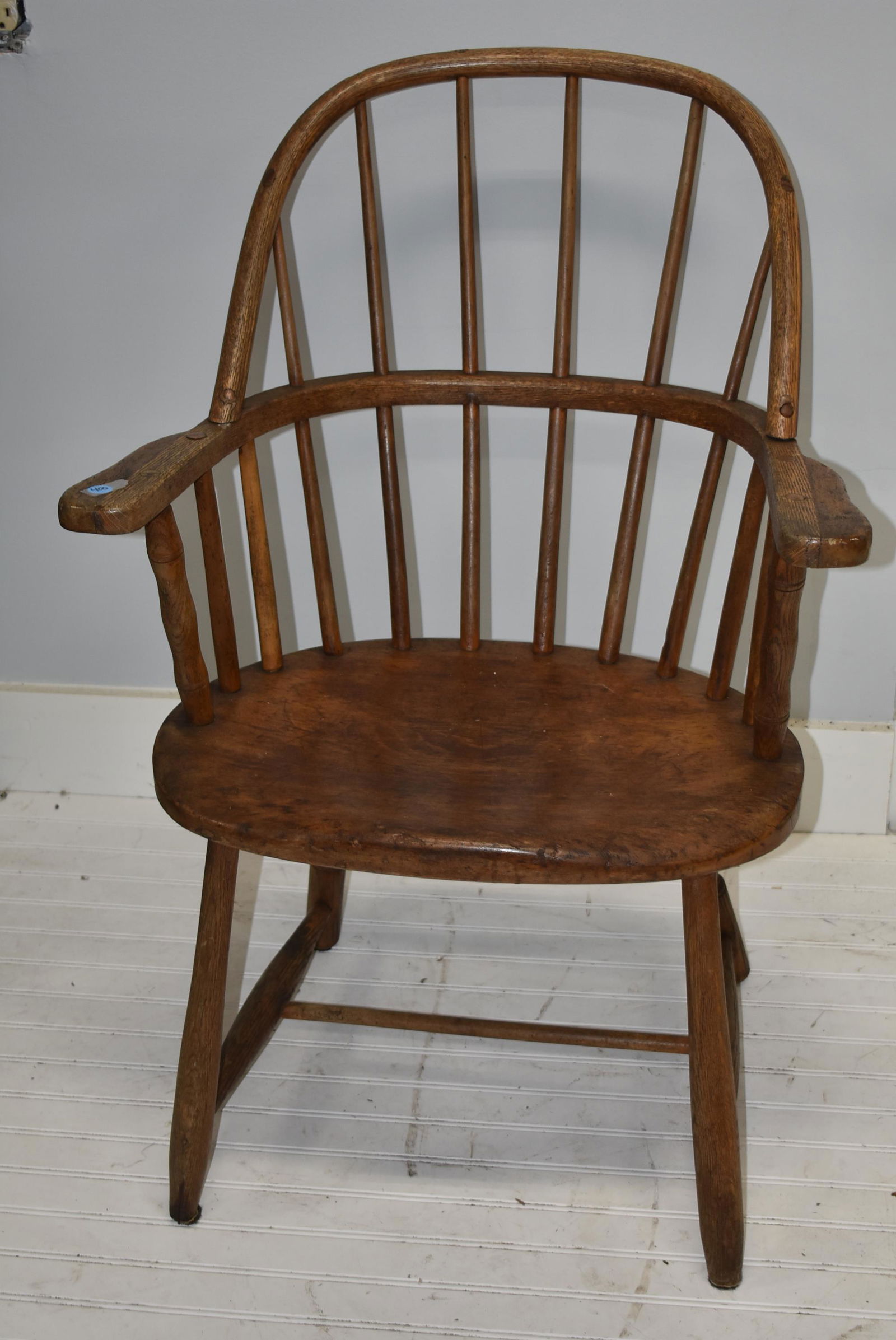 Windsor Chair with Flat Front Saddle Seat: Heavy mixed wood Windsor chair with one-piece saddle seat.
