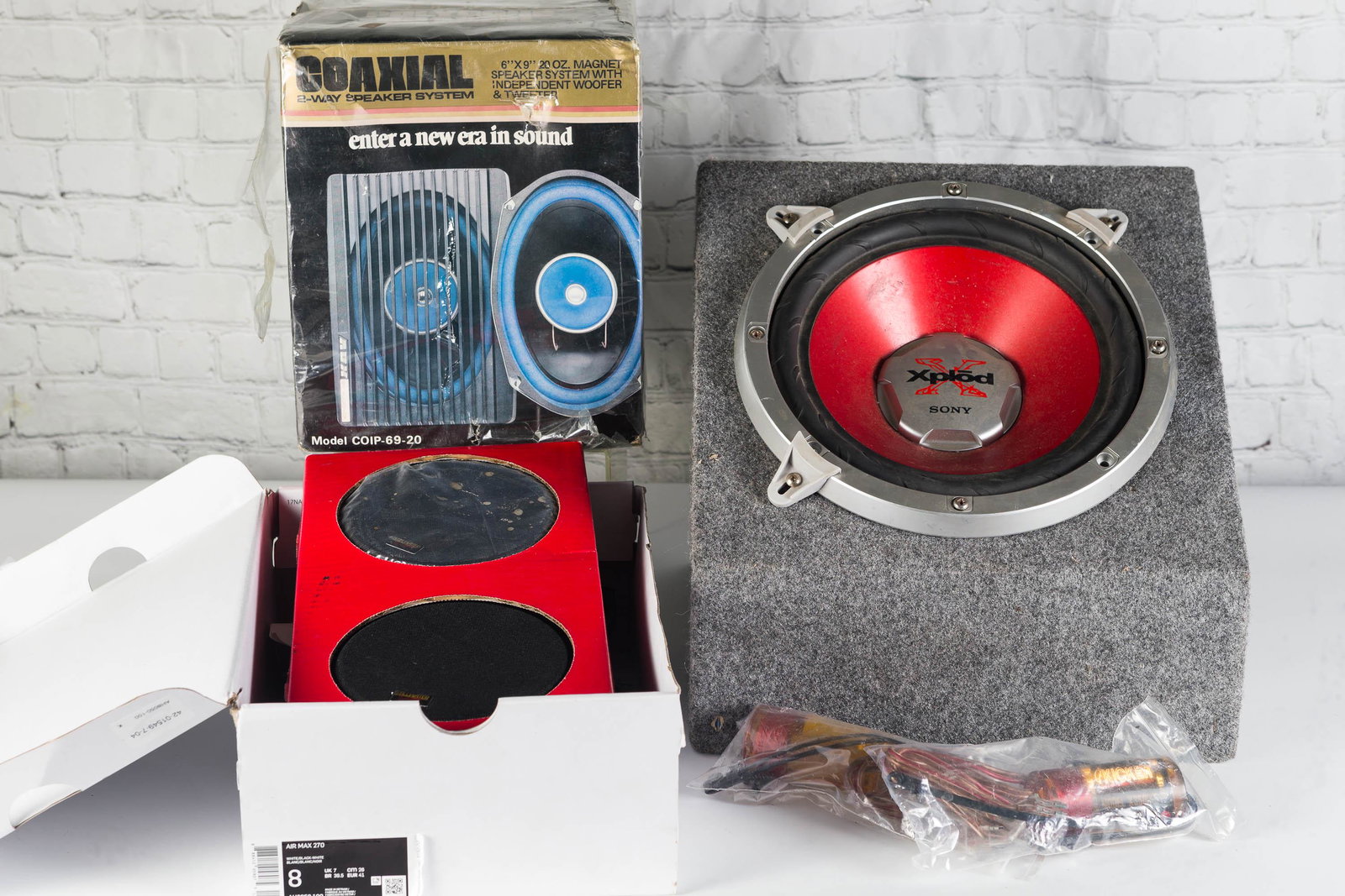 Auto Stereo Speakers NIB and More: Lot includes set of 6x9 audio stereo speakers by Audiovox. New in box (NIB). Lot also includes a pair of Stillwater stereo speakers (appears to be unused), various battery style accessories, and a Son