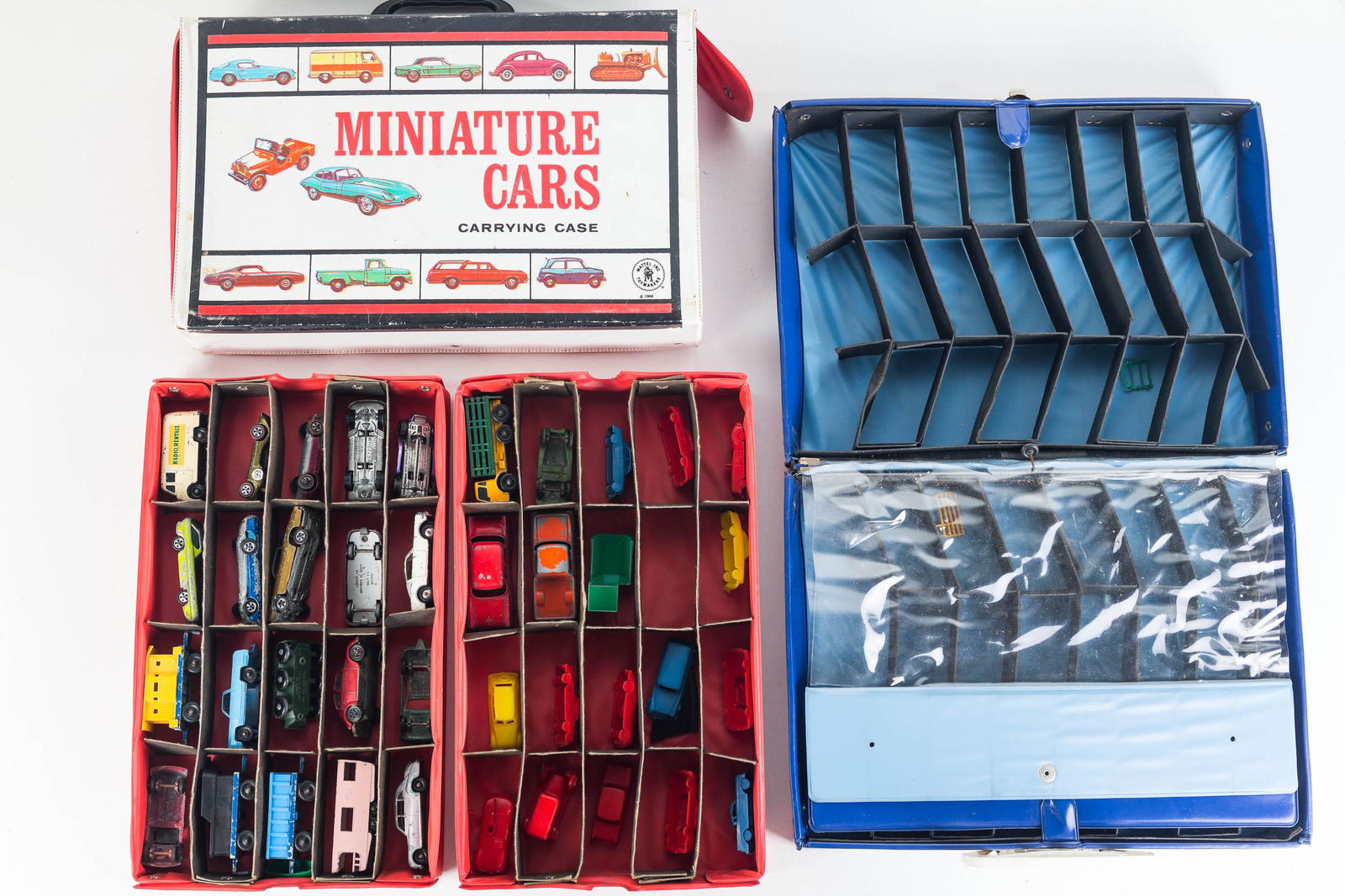 Hot Wheels, Matchbox, and Carrying Cases: Lot includes 4 Hot Wheels Red Line vehicles, other Hot Wheels, Lesney vehicles, Tootsietoy vehicles, and plastic miniature cars. Lot also includes a Matchbox and a Mattel Miniature Car carrying case (