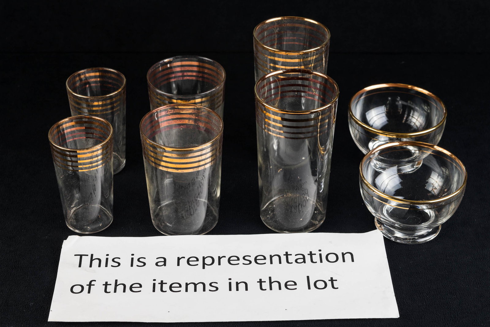 Glassware from a Radio Bar: Set of vintage gold flash glassware, purportedly from a radio bar. Some of the flashing shows wear.