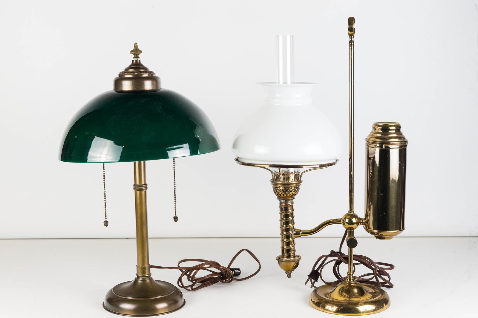 Vintage Student and Table Lamp: Lot includes an adjustable brass student lamp (20" to top of ring), and a green shaded table lamp with double sockets. Both lamps date to mid 20th C.