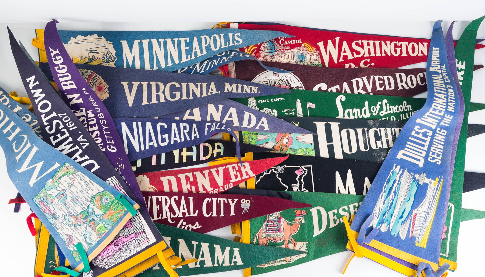 Vintage Travel Pennants: Lot includes many Minnesota pennants, Gettysburg, Dulles International Airport, Washington DC, Connecticut and many others. All measure approximately 24"L.