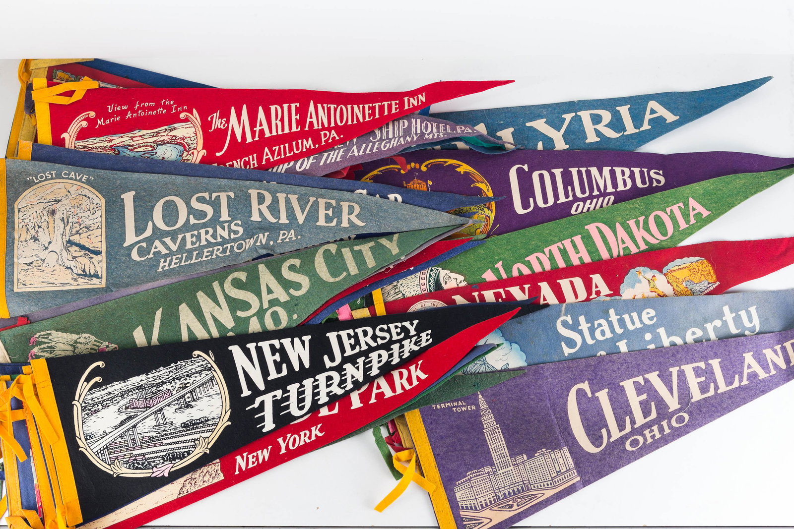 Vintage Travel Pennants: Lot includes Lost River Caverns, Hellertown PA, Delaware Water Gap, Minnesota, Missouri, NJ Turnpike, and others. All measure approximately 24"L.