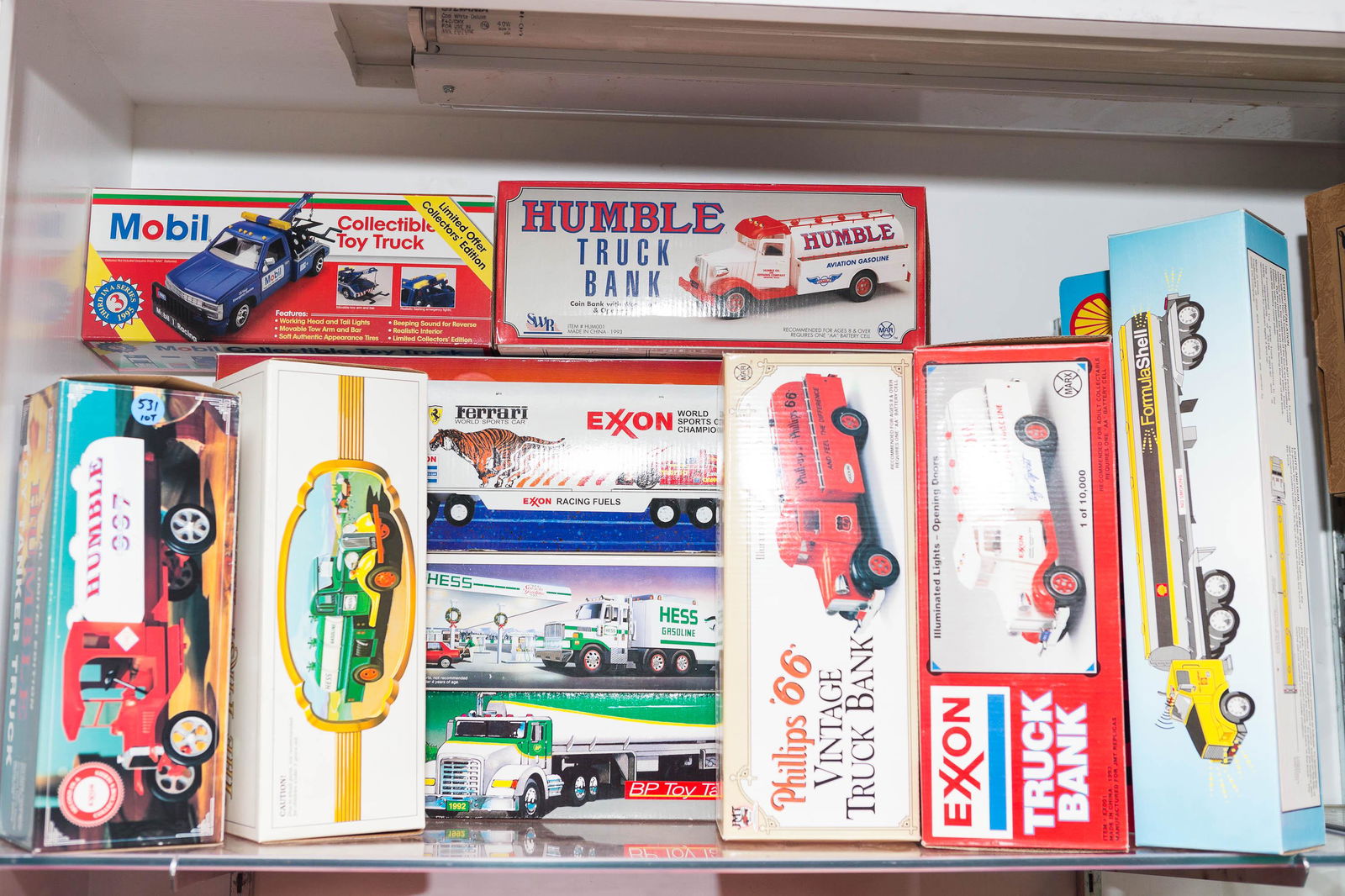 Hess and Other Advertising Vehicles: Lot includes 3 Hess trucks, Humble truck, Mobil, Exxon, and others. 10 total pieces.