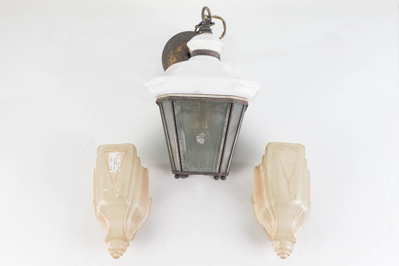 Vintage Porcelain Hanging Lamp and Shades: Lamp measures approximately 13"H. Heavy porcelain top and leaded glass section with original hanger. Lot also includes 2 Art Deco hanging light shades from a larger unit.