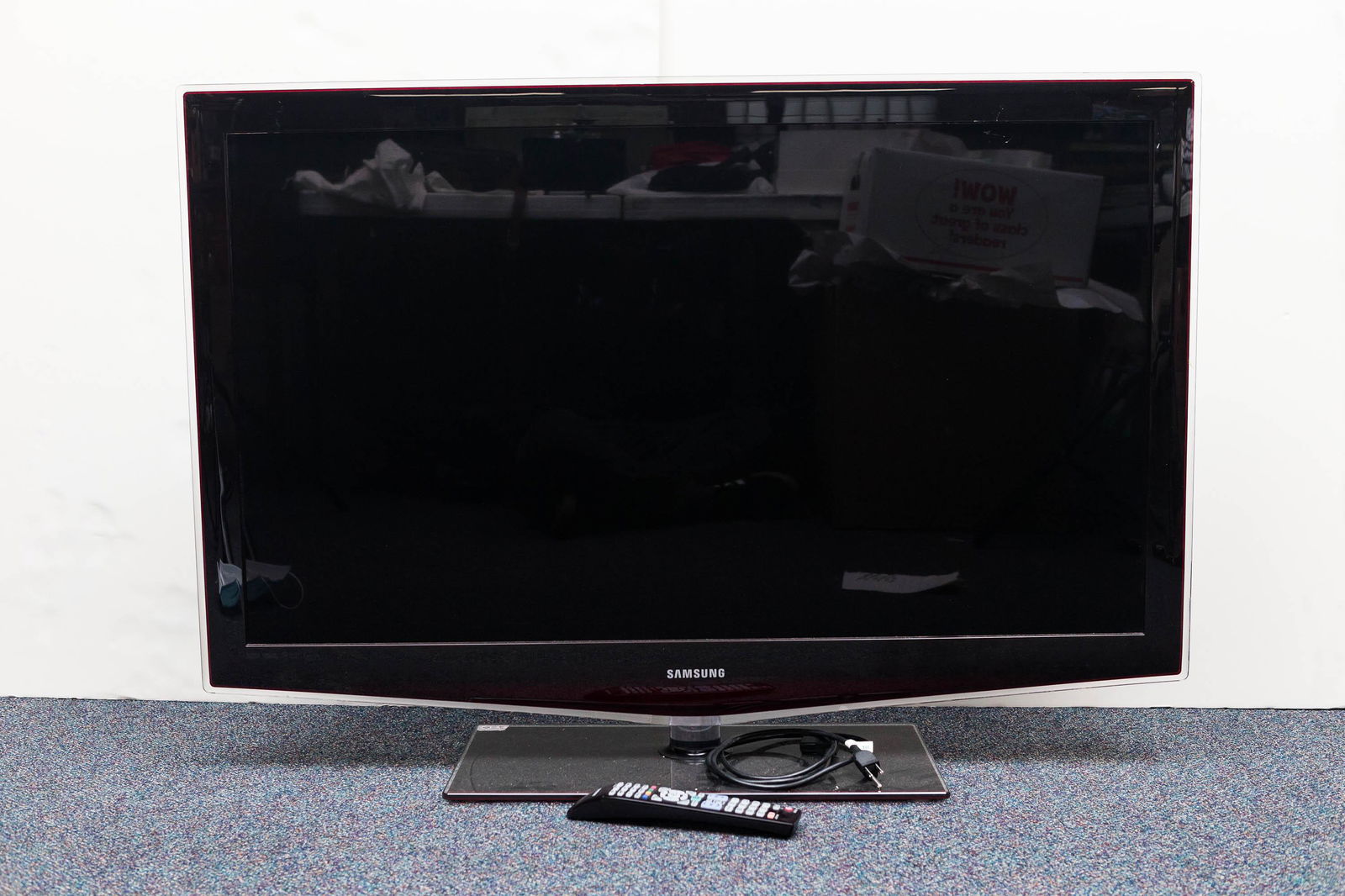 Samsung Flat Screen TV: Item measures approximately 31"H (including base) and 44"W. Screen measures approximately 45" diagonally. Model No. LN46B650T1F.