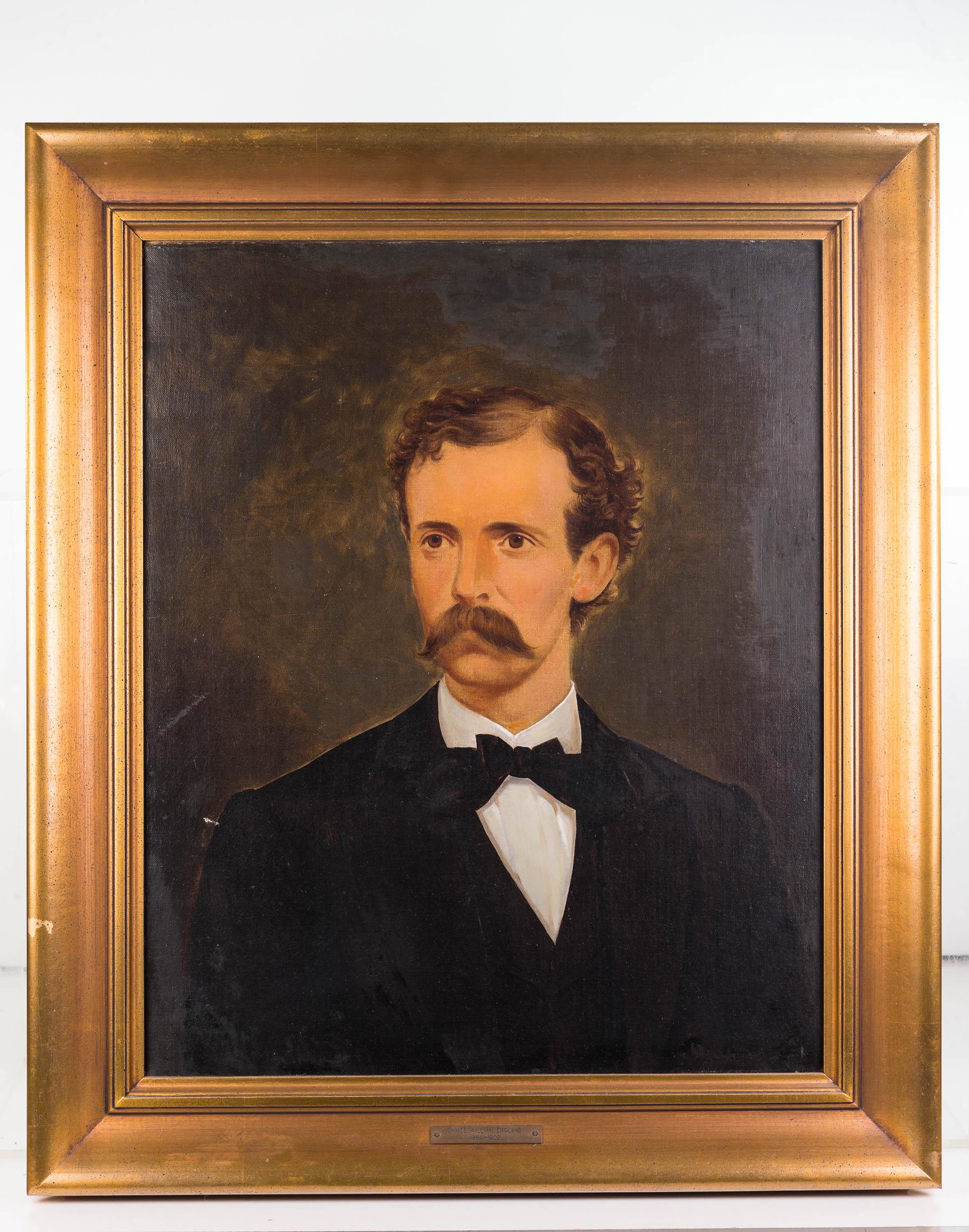 Portrait on Canvas of James William England: Exposed area measures approximately 22"H x 17.5"W. Well executed portrait on canvas. Tag reads "James William England 1864-1909". Painting has some crazing and varnish wear, and a minor scuff at right