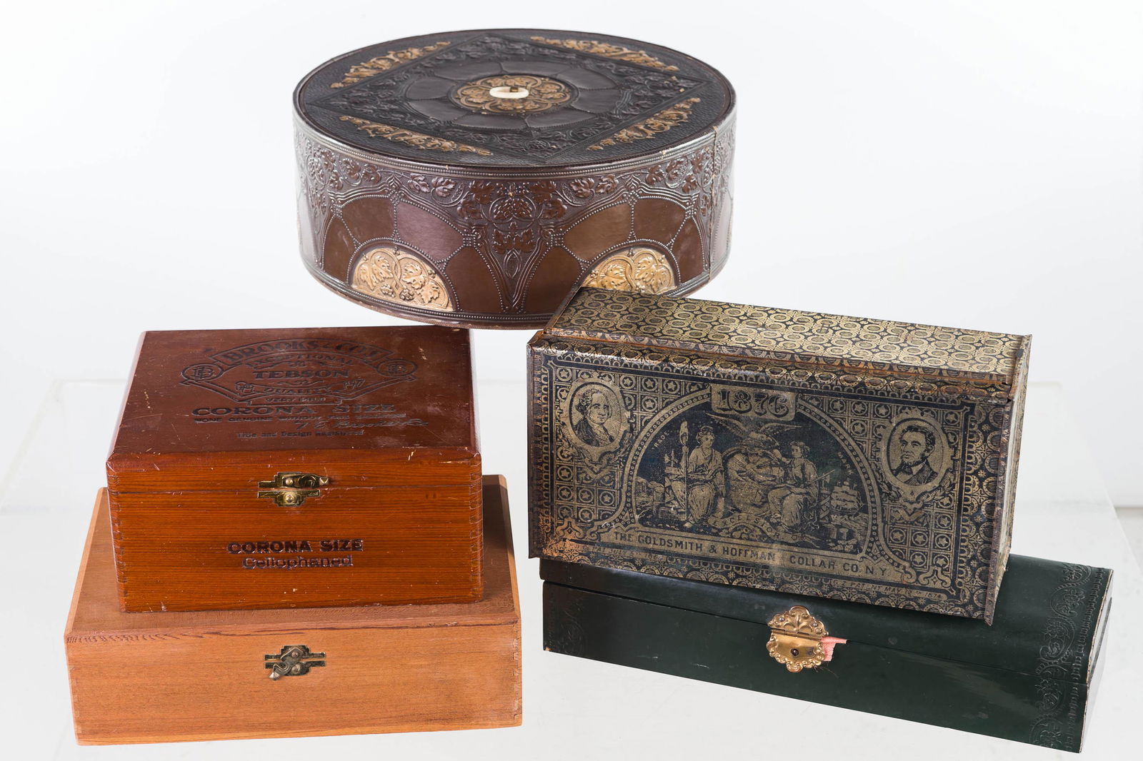 Victorian Color Boxes and Others: Lot includes Goldsmith & Hoffman tin litho slide top color box, green Victorian color box, two wooden cigarette boxes, and a circular box (possibly for colors).