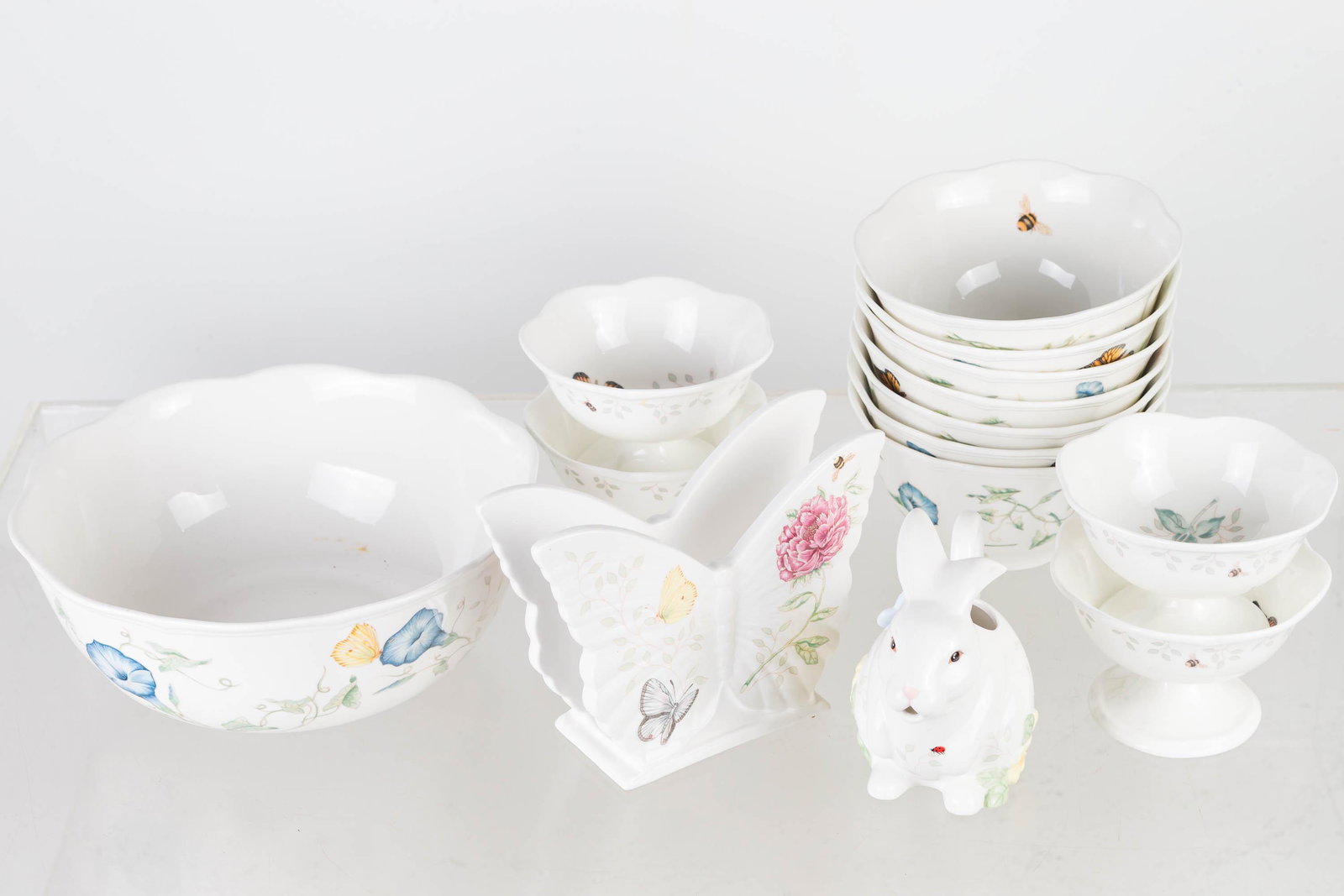 Lenox Butterfly Meadow Grouping: Lot includes vegetable bowl (8.5" diameter), napkin holder, 7 soup bowls, a rabbit creamer, and 4 footed sherbets.