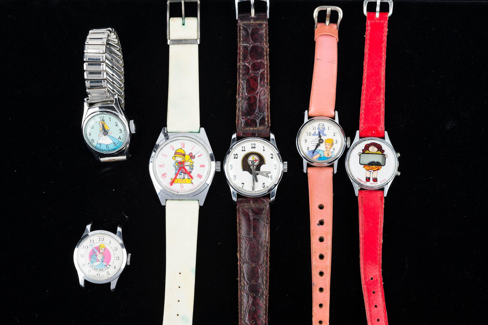 Vintage Novelty Watches (6): Two are circa 1960s Cinderella watches, one is signed Bradley, a Walt Disney Cinderella on original strap, Alice in Wonderland Timex, Cabbage Patch Kids and more.