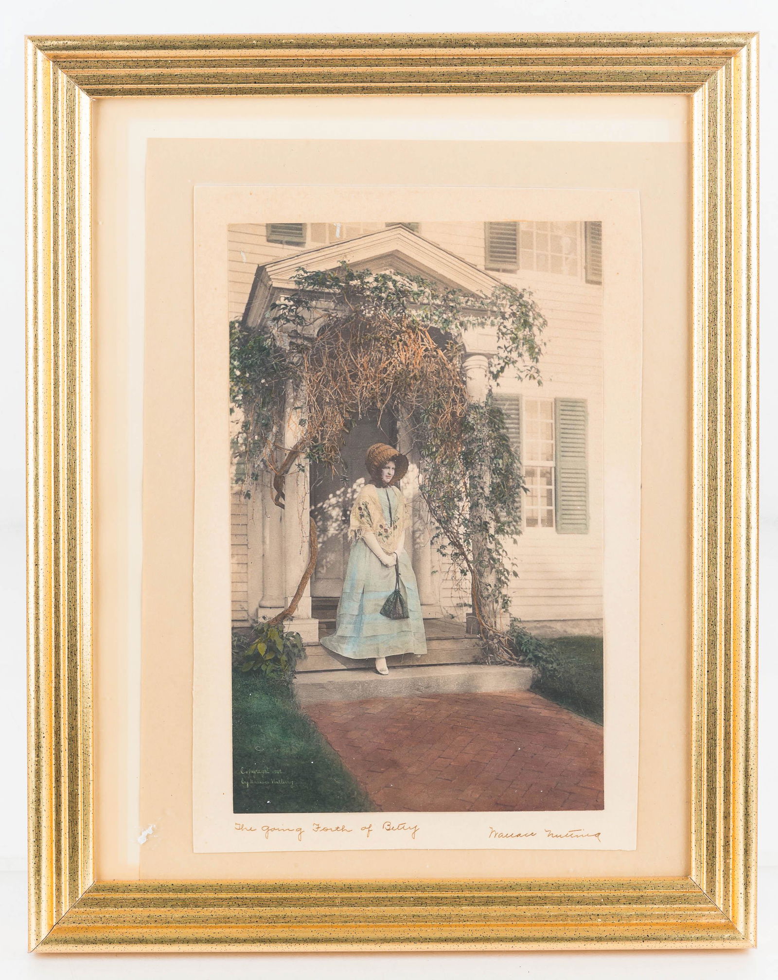 Wallace Nutting Portrait: Early first quarter 1900s hand tinted photograph titled "The Going Forth of Betty". Signed Wallace Nutting.