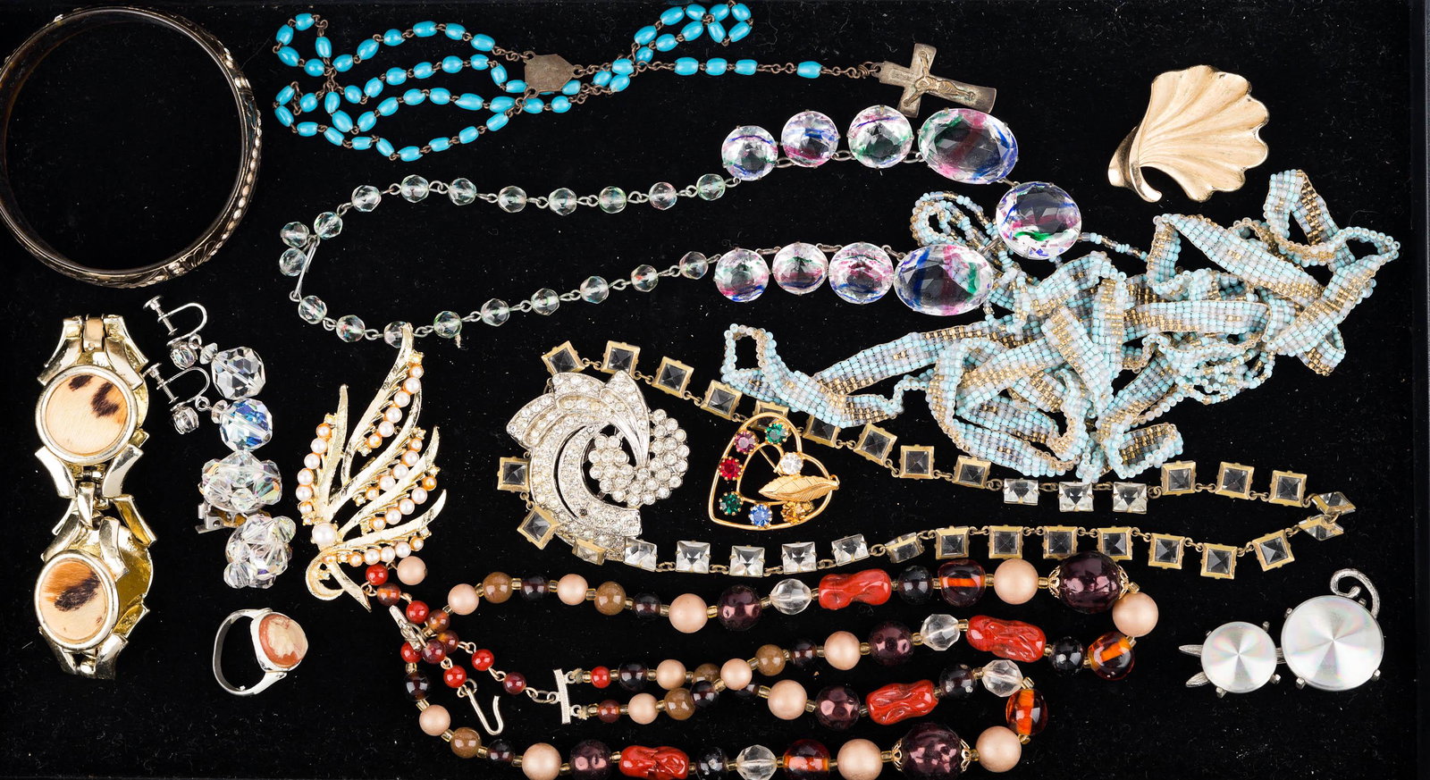 Art Deco Jewelry and More: Several glass and bead Art Deco necklaces, brooches, bracelets, and more.
