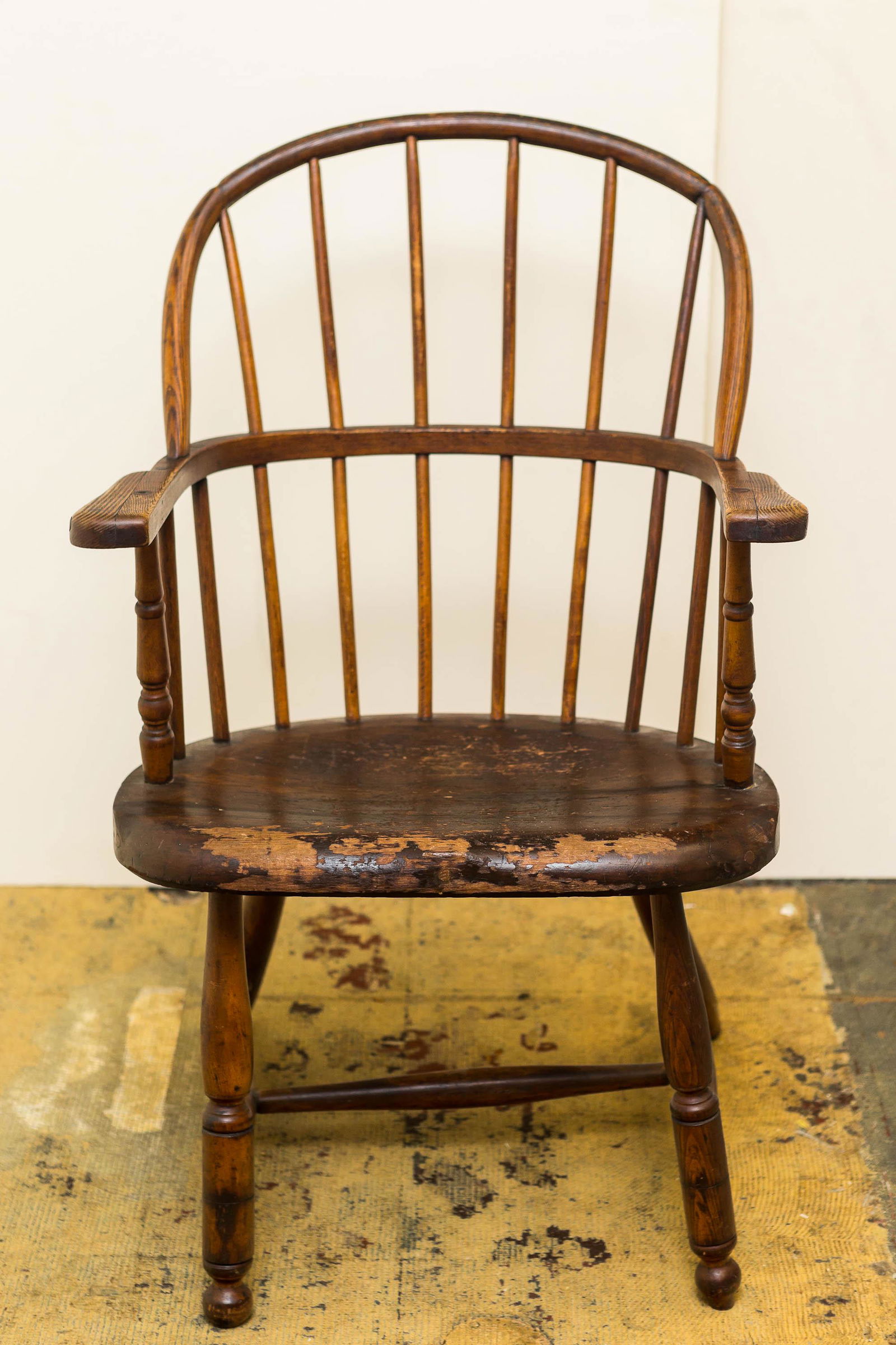 19th Century Windsor Chair: Mid-Atlantic Windsor chair measuring approx. 35.5"x22.5" and 24" deep has loose joints and some loss.