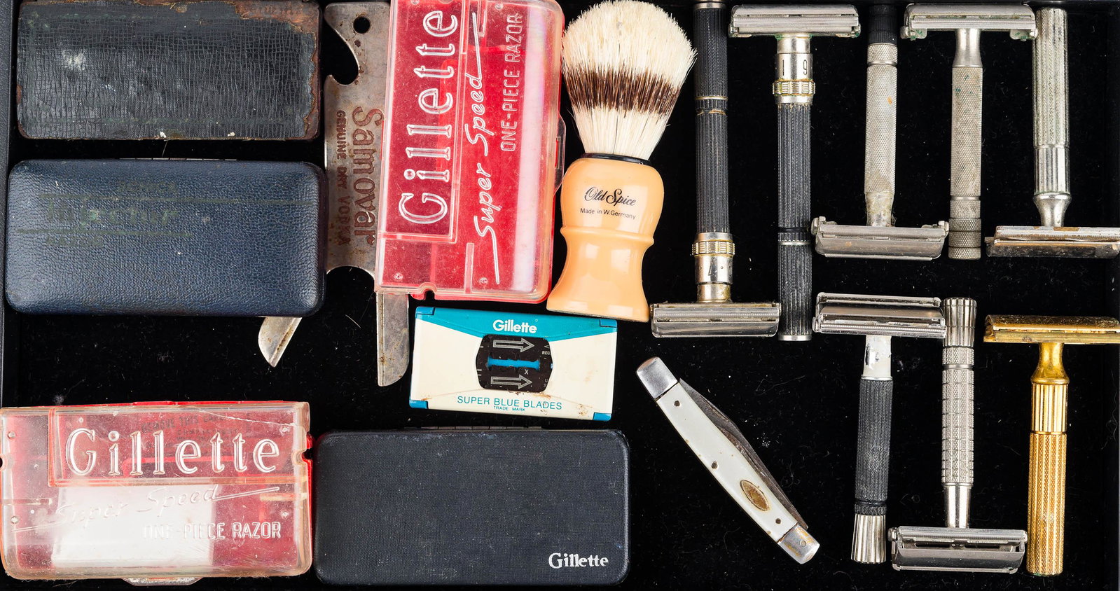 Collection of Double Edged Razors: Lot includes a wide selection of double edged razors, razor cases, a folding knife with mother of pearl handle, and an advertising bottle opener.