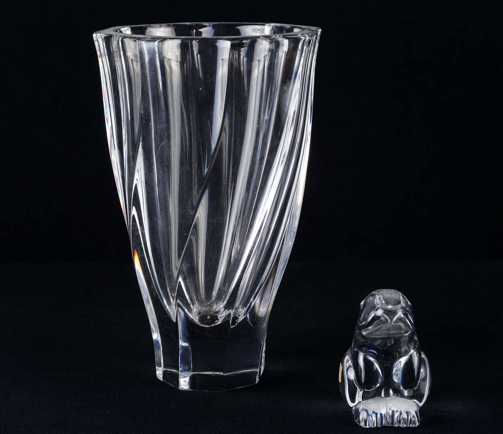 Baccarat Paperweight and Orrefors Vase: Lot includes Baccarat rabbit paperweight (3"H) with Baccarat etched on bottom and original paper label, and a marked 8" Orrefors crystal vase.