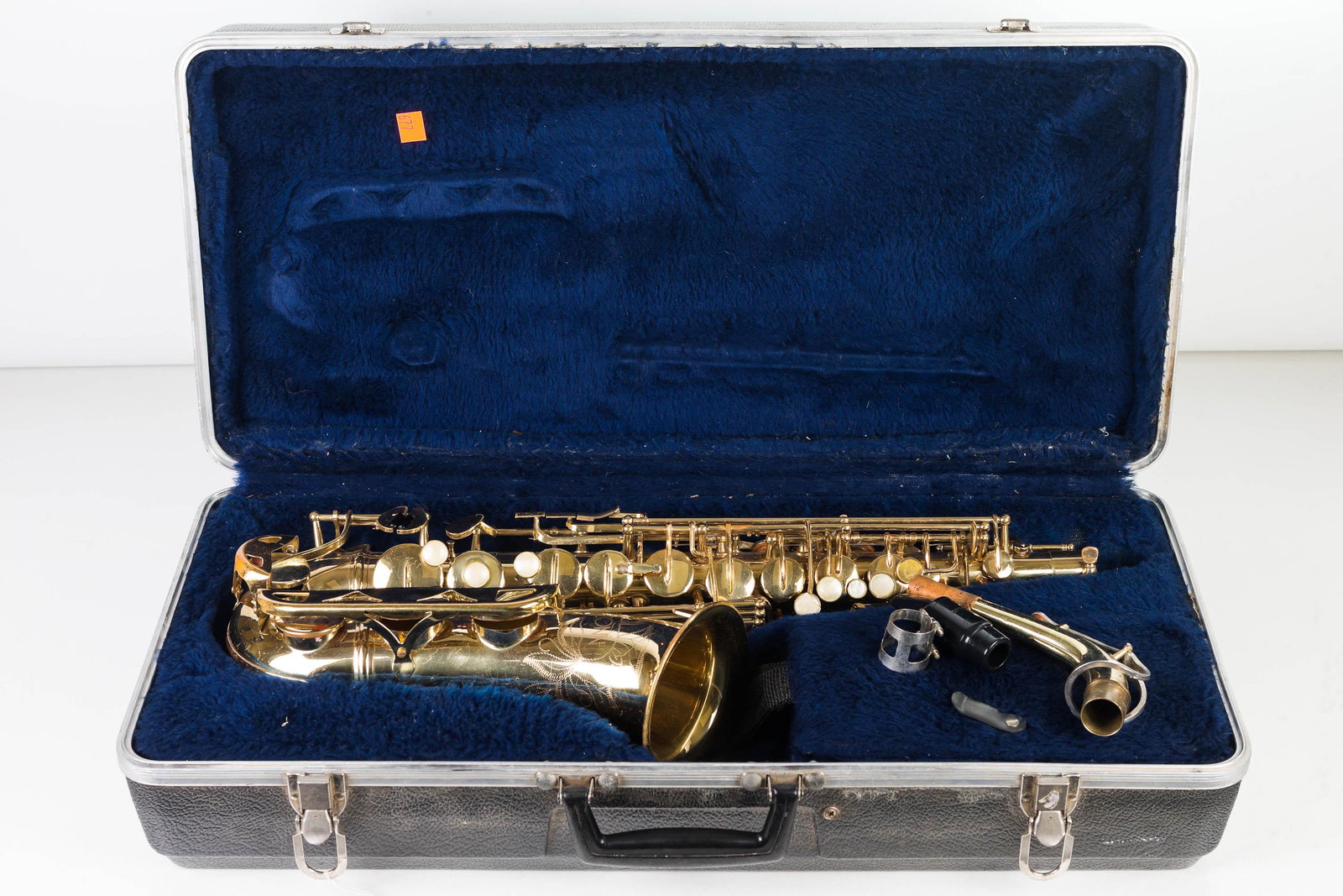 Conn Alto Saxophone: Alto sax has serial No. 186714. It comes in hard shell case. It shows some oxidation on back side and appears to be missing one mother of pearl cover on key.