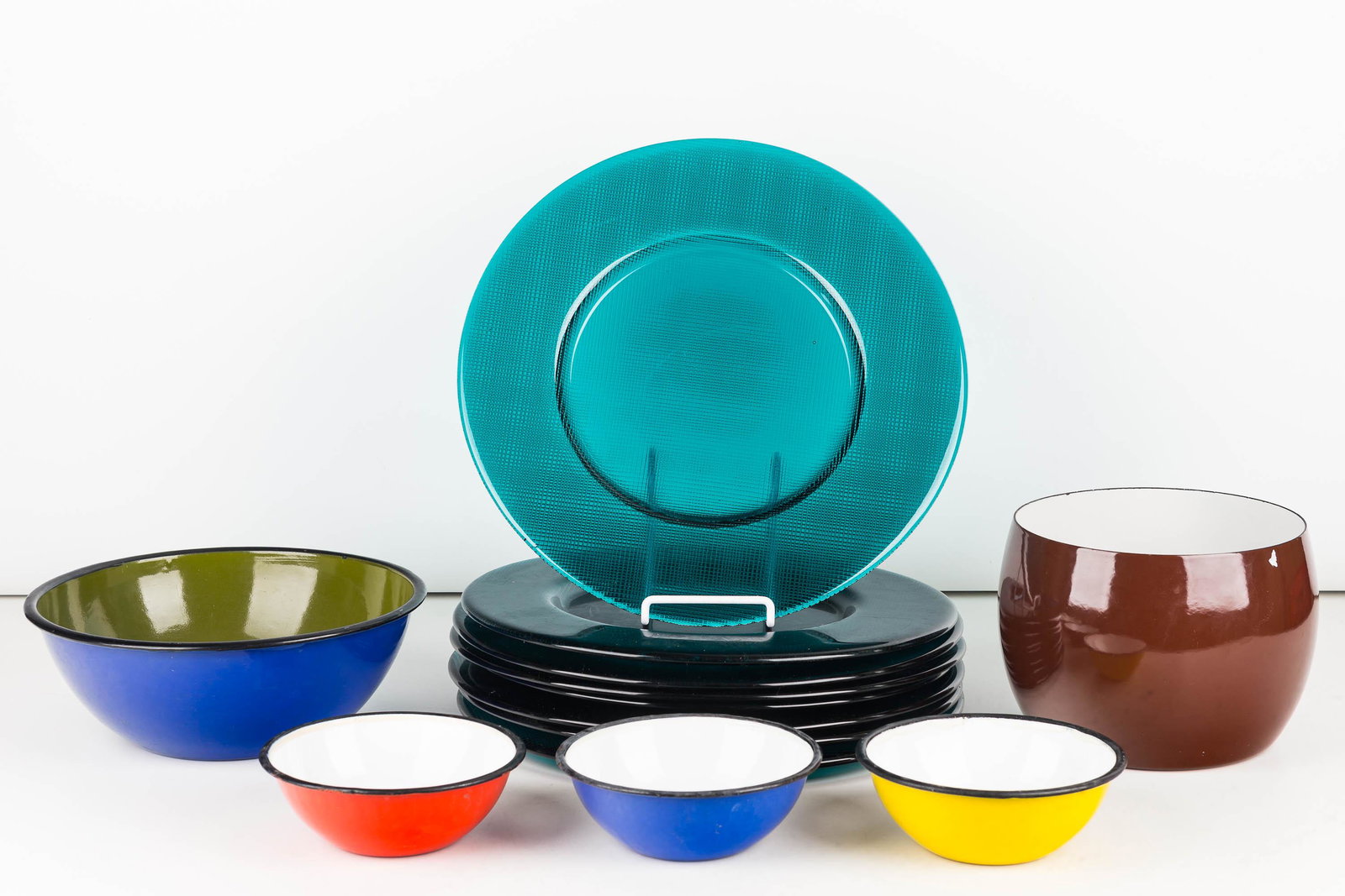 Dansk Pot and Dinnerware: Lot includes an brown enamel Dansk pot (6"H), three contemporary enamelware bowls, and 8 large aqua glass dinner plates.