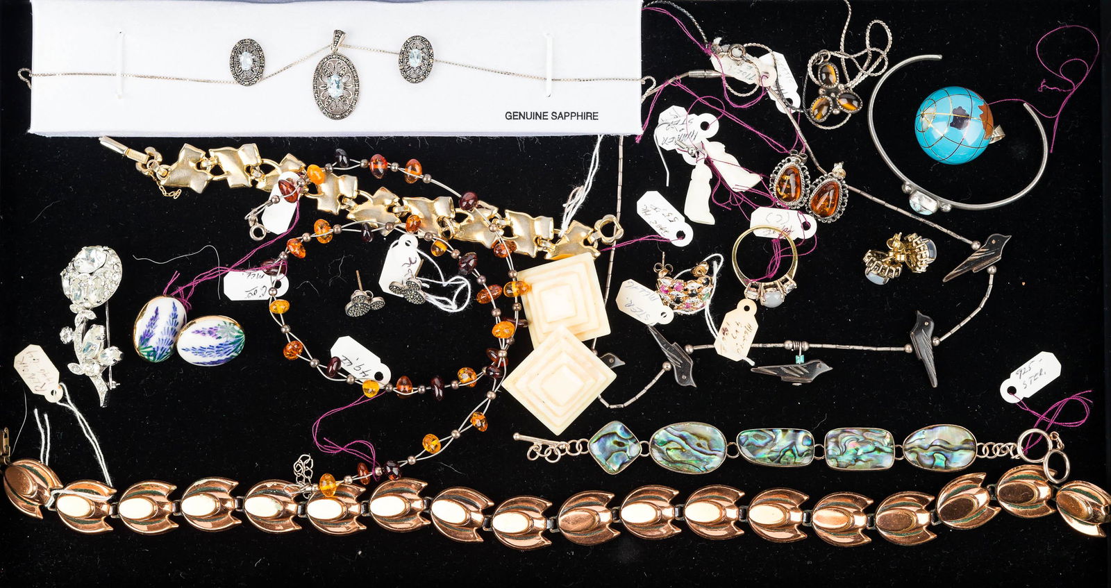 Sterling and Related Jewelry: sterling and abalone bracelet, Eisenberg floral clear rhinestone brooch, delicate Navajo sterling bracelet with turquoise stone, pair of amber post earrings, sterling tiger eye pendant on chain, sterl