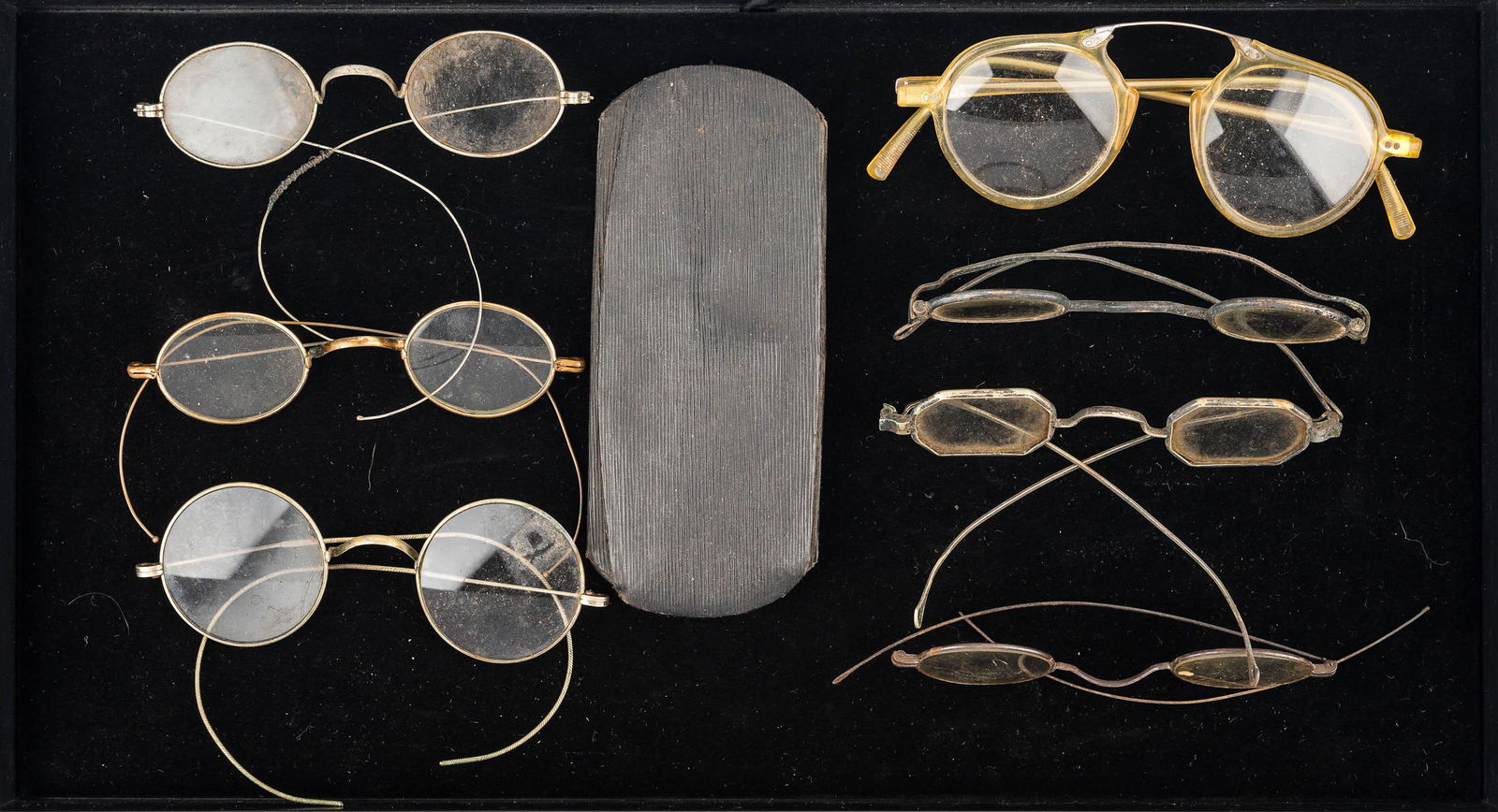 19/20th C Eyeglasses: Seven pairs of eyeglasses, one with loss to arm, a pair of septagonal Civil War era glasses, a pair of oval glasses from the same era, and various others.