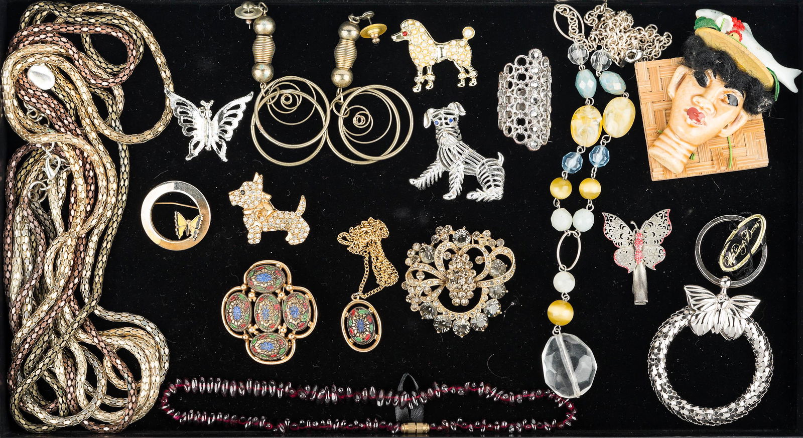 Figural and Other Costume Jewelry: Three various dog pins, Scotty missing one tiny stone (marked Monet), butterfly pin and clip, large butterfly keychain ring marked Whiting & Davis Made in USA, Sarah Coventry hand painted brooch and n