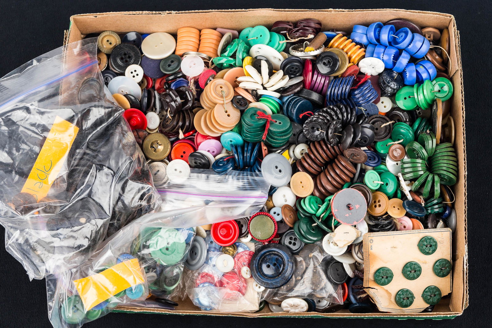 Vintage Button Collection: hundreds of vintage buttons of various colors and styles, some may be Bakelite.