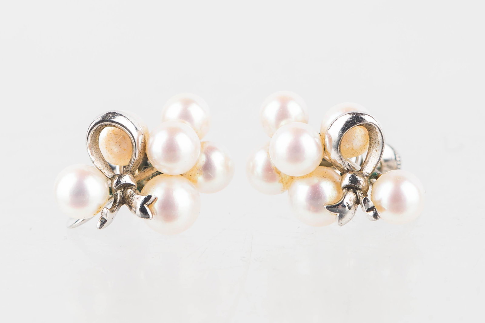 Vintage Mikimoto Earrings: Large Akoya 6 good lustre pearl in each sterling silver ribbon screw back earrings stamped M-Mikimoto.