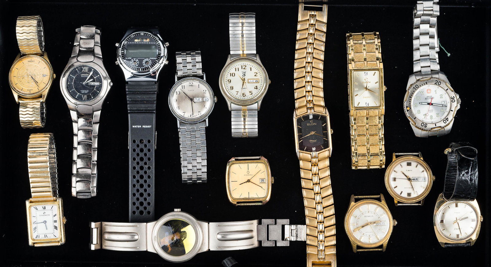 Collection of Men's Wrist Watches: Seiko with college logo and date, Citizen Eco Drive with day/date, Swiss Military wrist watch marked Swiss Made 100m, an Elgin Diamond, other Elgin, and a Sebastian with reflective face.