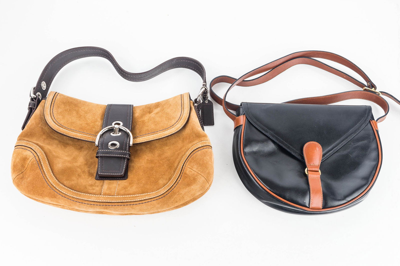 Two Leather Shoulder Bags / Coach, Vera Pelle: The Coach bag is a subtle tan suede with brown leather strap and snap closure, the Vera Pelle is a black leather with brown strap. Gently used.