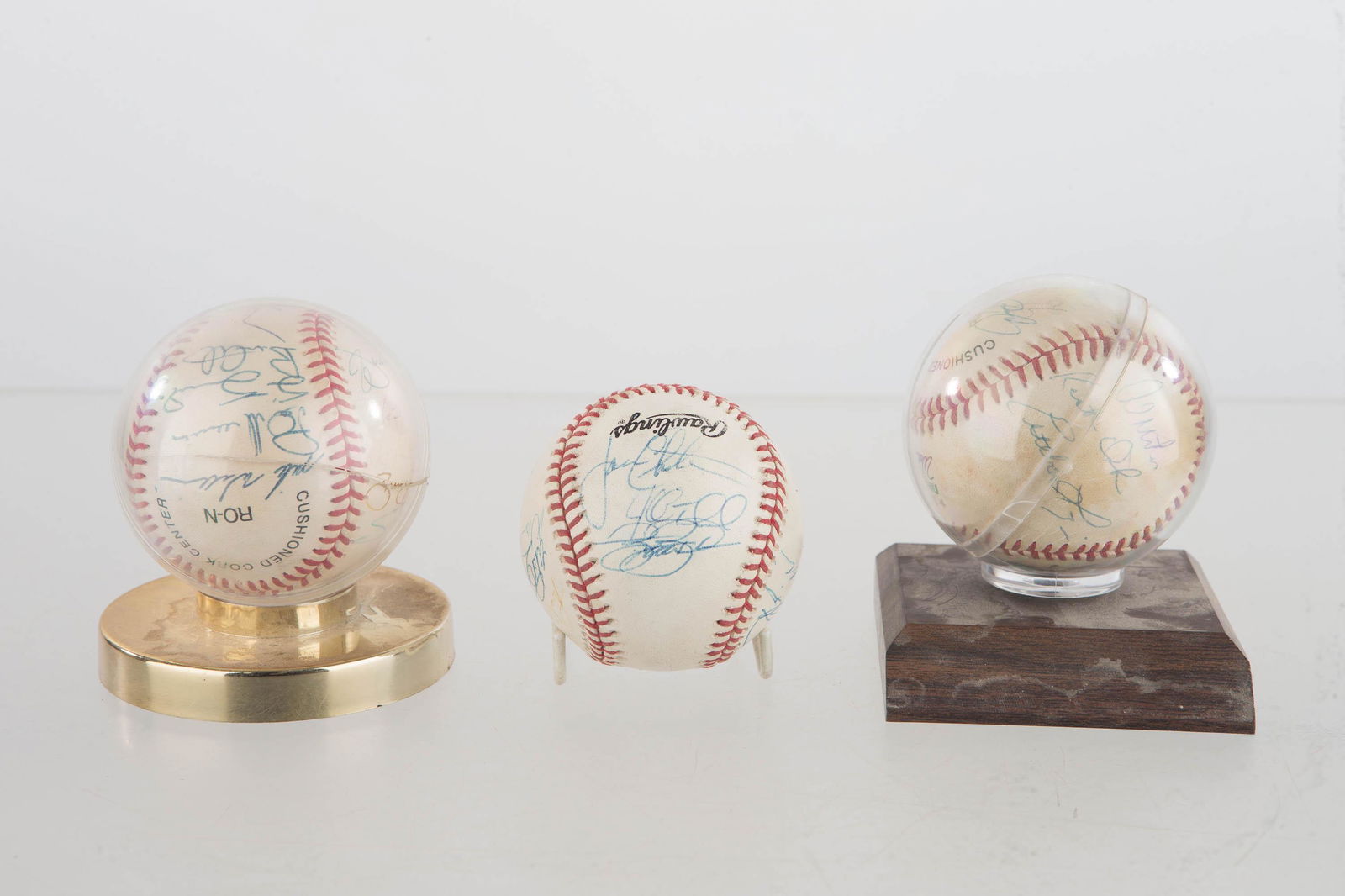 3 National League Team Autographed Baseballs: All balls are team autographed on National League balls. One baseball has Kevin Young, Pat Mahomes, J.R. House Brian Giles, Scott Sauerbeck, and Mike Williams, plus others, which places this to be the