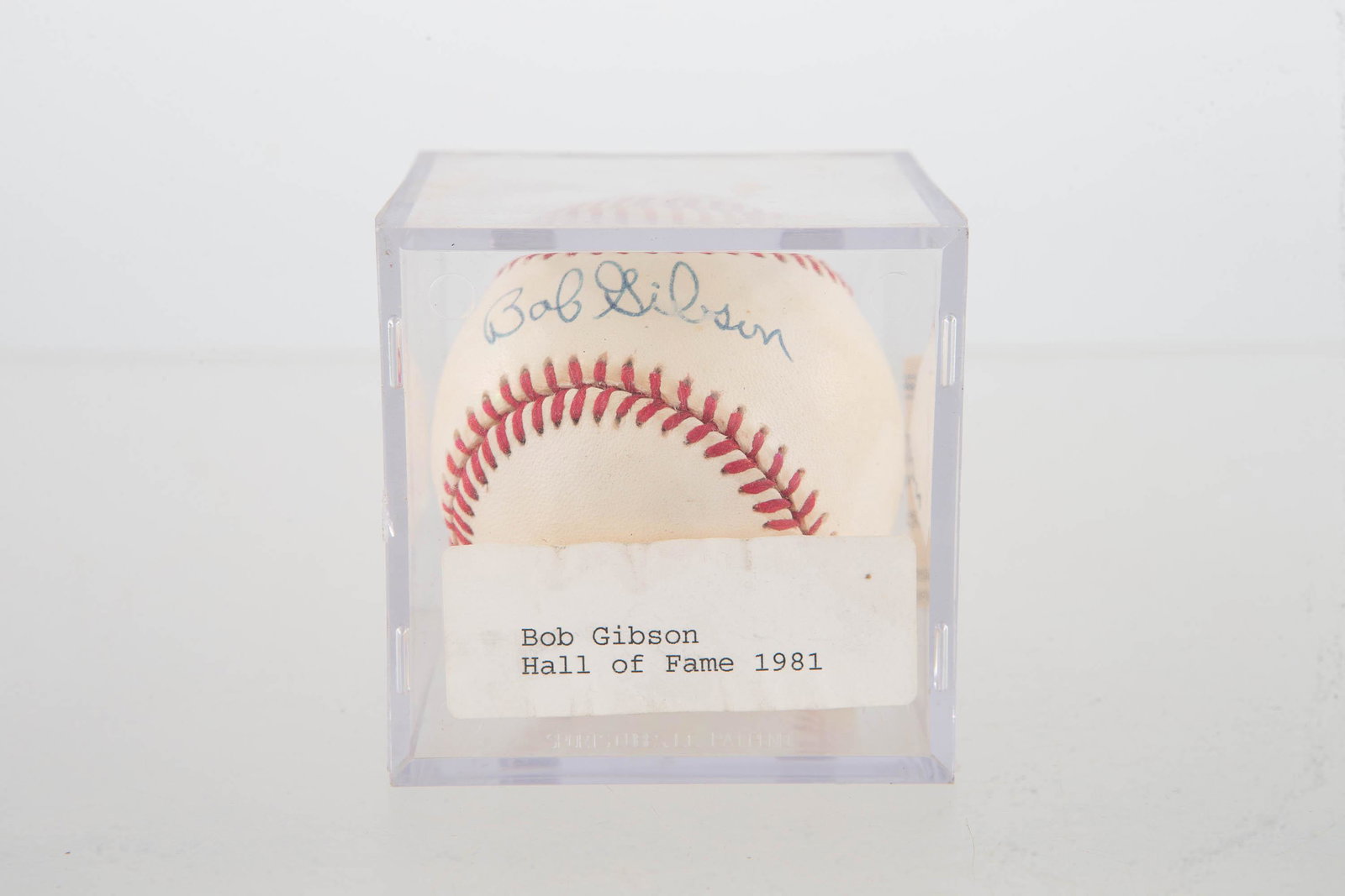 Bob Gibson Autographed Baseball w/ C.O.A.: Cardinals star Bob Gibson autographed baseball with C.O.A. documenting that it was signed in front of Greg Weachter in East Petersburg, PA. Ball is in baseball case.