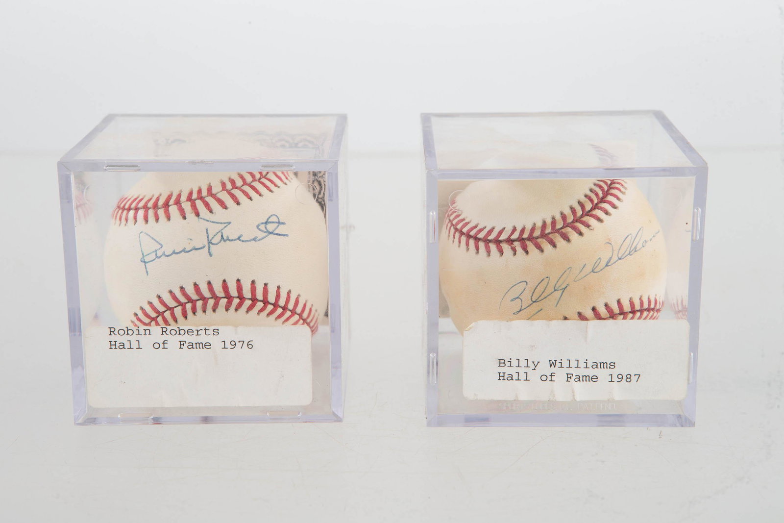 2 Autographed Baseballs w/ C.O.A.s: Phillies star Robin Roberts & Cubs star Billy Williams autographed baseballs with C.O.A.'s for each documenting that they were signed in front of the individual listed on each. Robin Roberts C.O.A. is