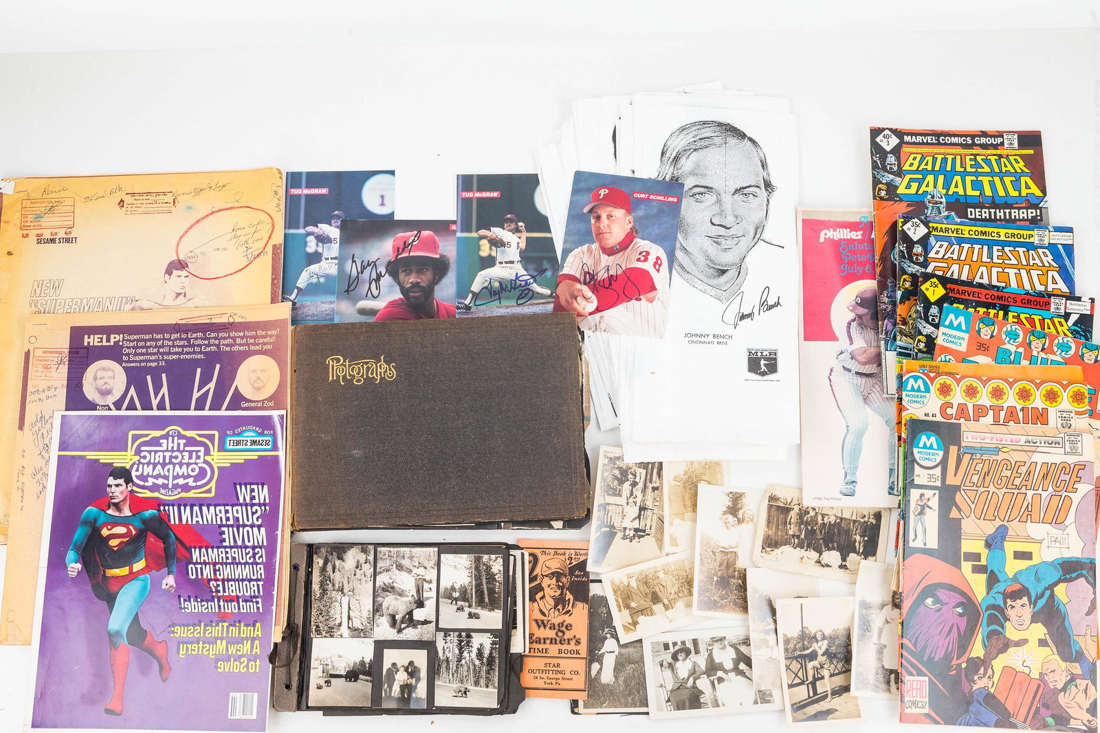 Comics, Vintage Photographs, and Sports autographs: Battlestar Galactica comics, an Electric Company magazine with Superman, an old photo album with black and white photos/some loose, and autographed sports figure cards. a Salute to Pete foldout, plast