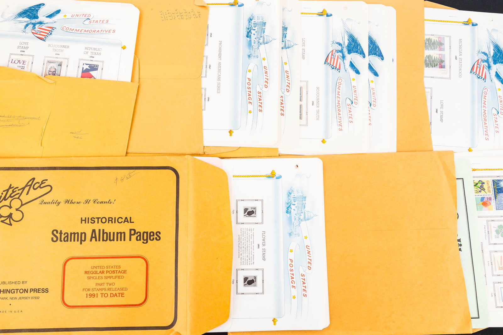 Historical US Postage Stamps Set White Ace: Lot includes 1991 Single Simplified Part 2, 1986 O set, 1986 PB-38S, 1987 PB-28, 1987 PB-39, and 1987 P. Most have stamps but not verified but one is completely empty.