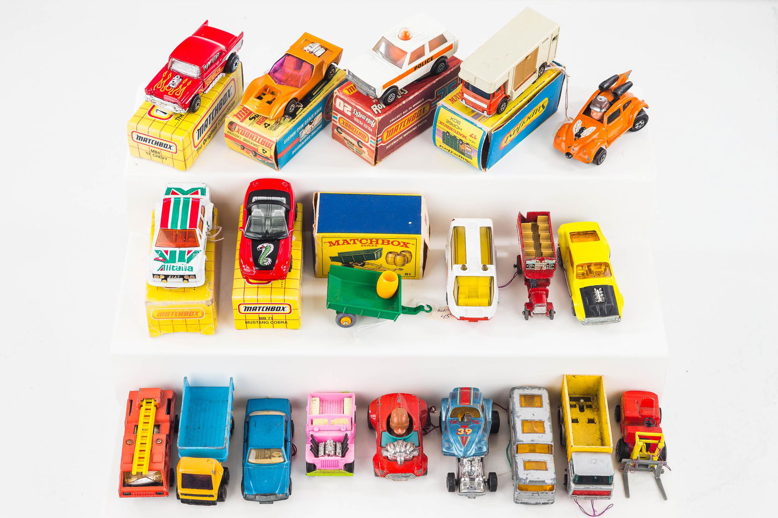 Lesney Matchbox Vehicles, Some Rare: Lot includes 7 Matchbox and Matchbox Super Fast with original box, a pink Jeep marked Lesney 1971, VW Beetle with driver and rocket engines marked Super Fast Lesney 1972, double decker open bus marked