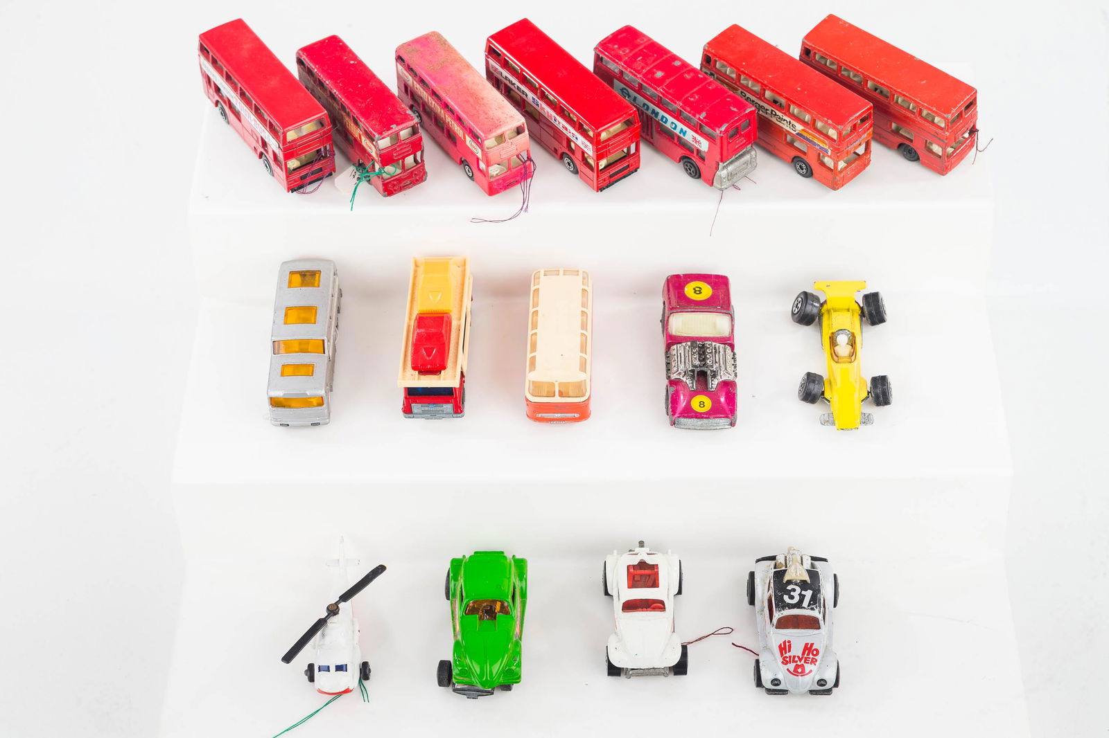 Matchbox Lesney Vehicles: Lot includes 8 buses, Hi Ho Silver VW Beetle (Lesney, 1979), Blazin' Bug (1983), Dragon Wheels, Drag Funny Car (Lesney, 1972), a Mercedes Benz coach bus, a Formula 1 race car (Lesney, 1970), Road Drag